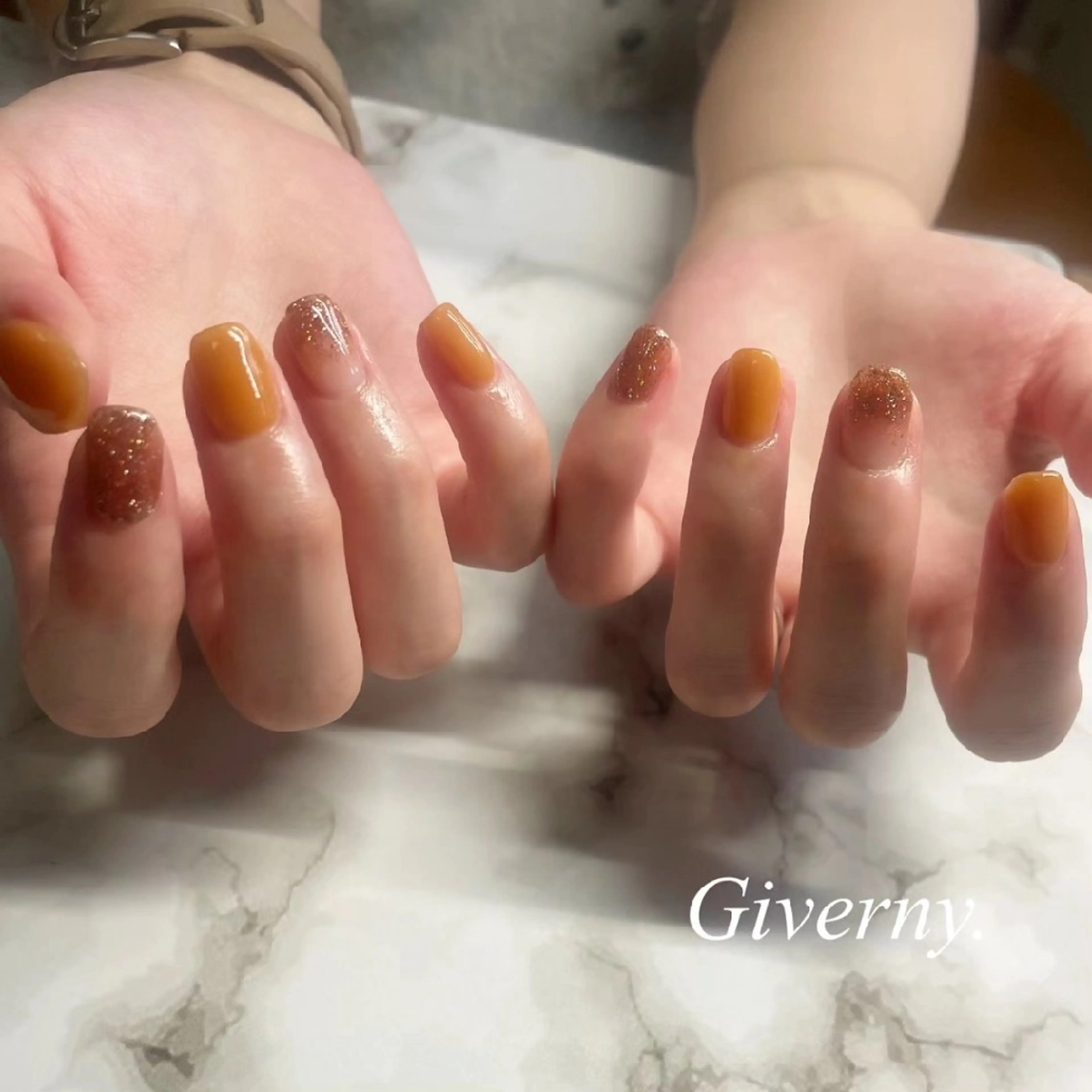 ネイル グラデーション ラメ(グリッター) ラメグラデーション ワンカラーネイル オレンジ ハンドネイル Giverny .のネイルデザイン