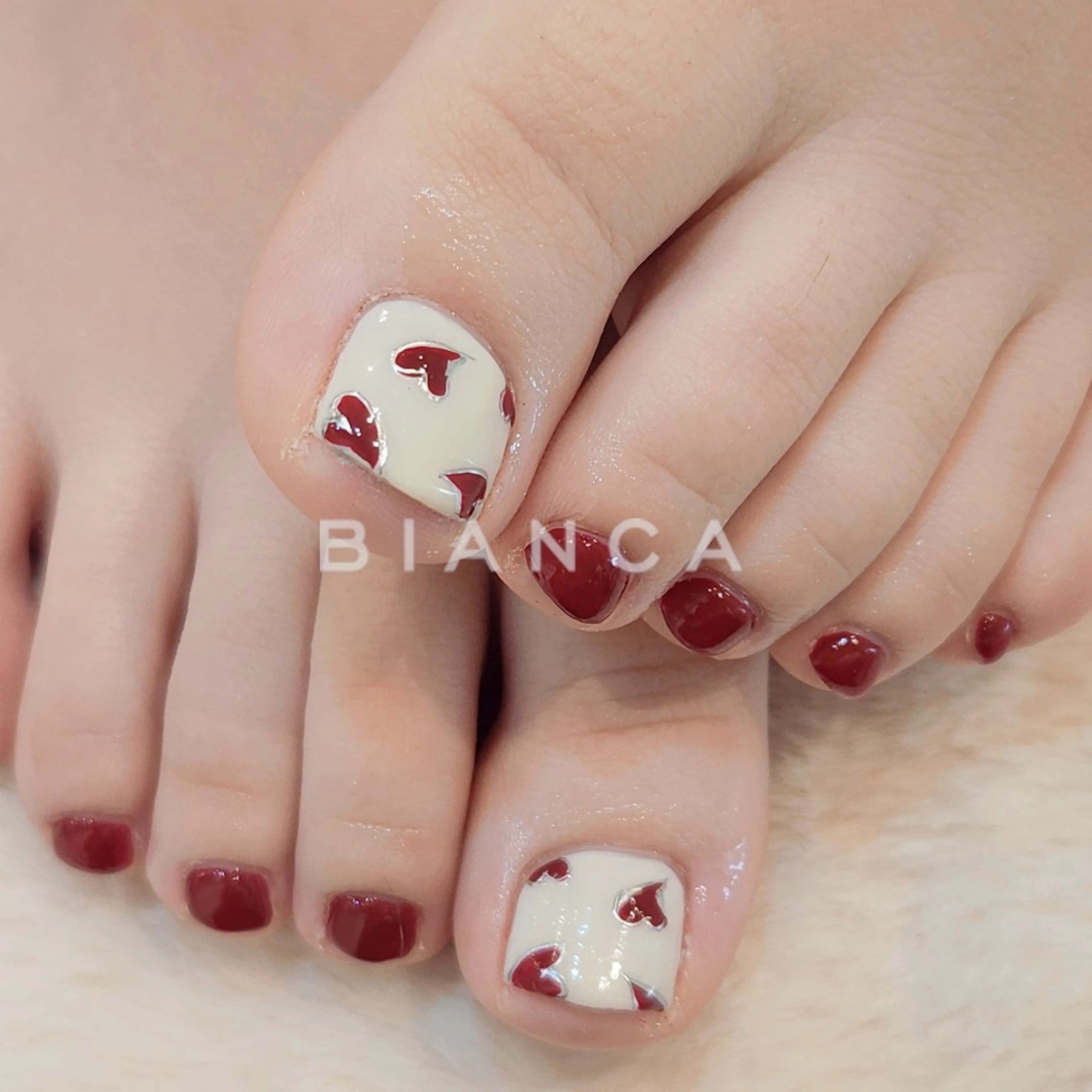 ネイル アートネイル ボルドー ハート ワンカラーネイル 赤色 フットネイル Bianca名駅店 あゆのネイルデザイン