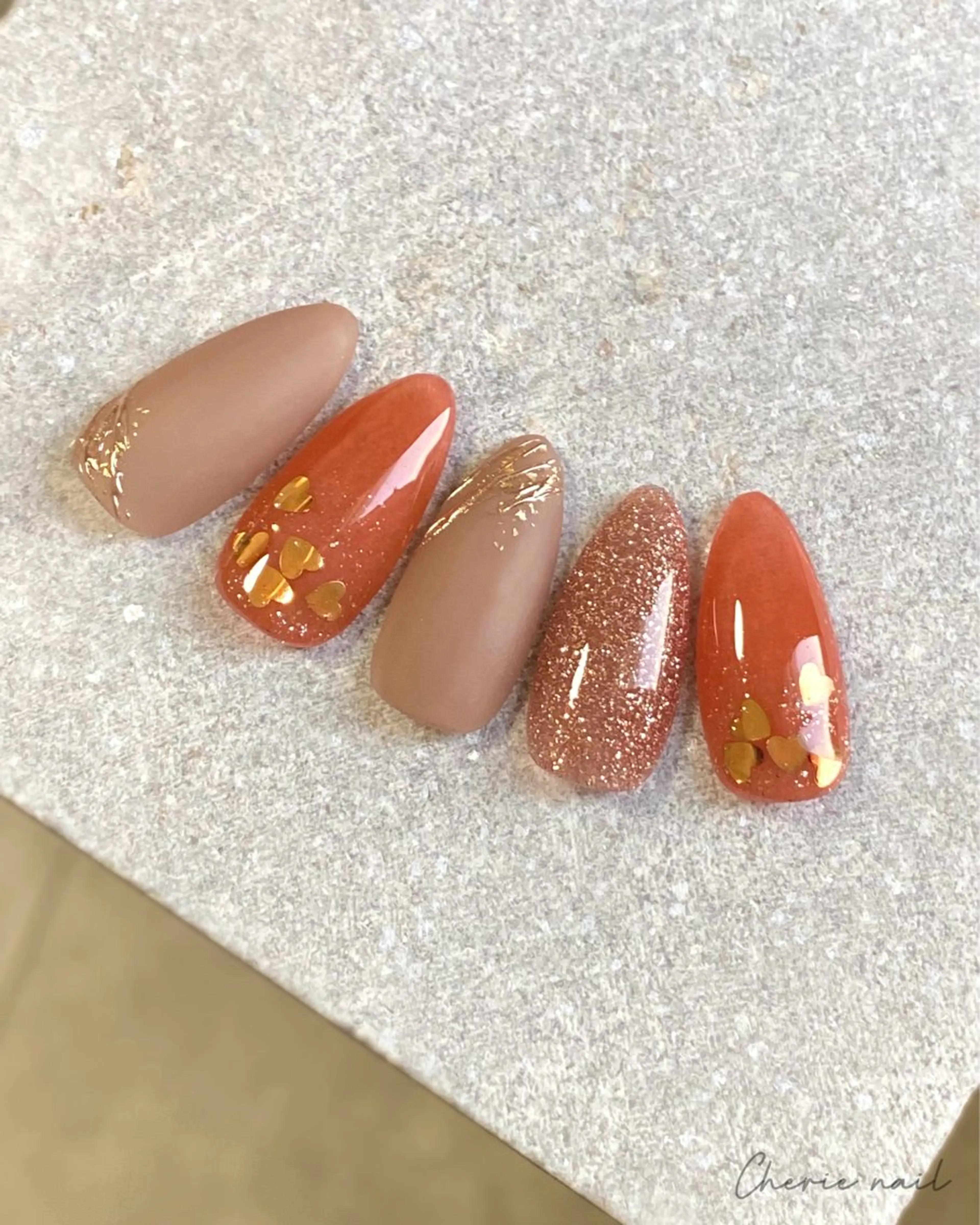 ネイル フラッシュネイル ジェルネイル ハート ラメ(グリッター) オレンジ ハンドネイル Cherienail yunaのネイルデザイン