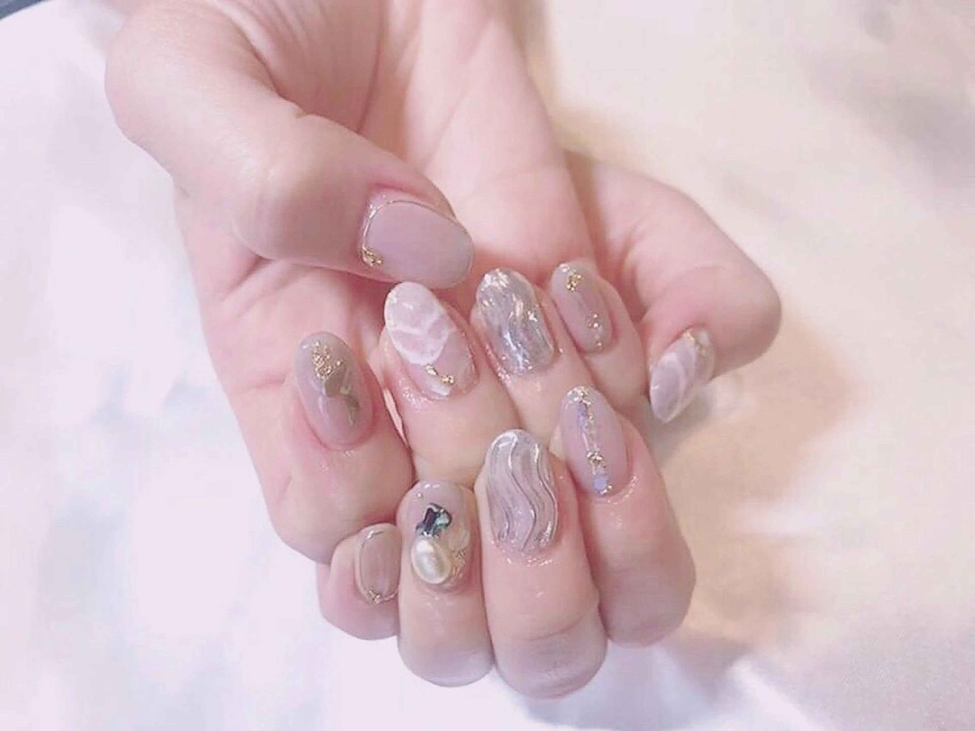 ネイル 指名支持率NO.1 スタイリストのヘアスタイル