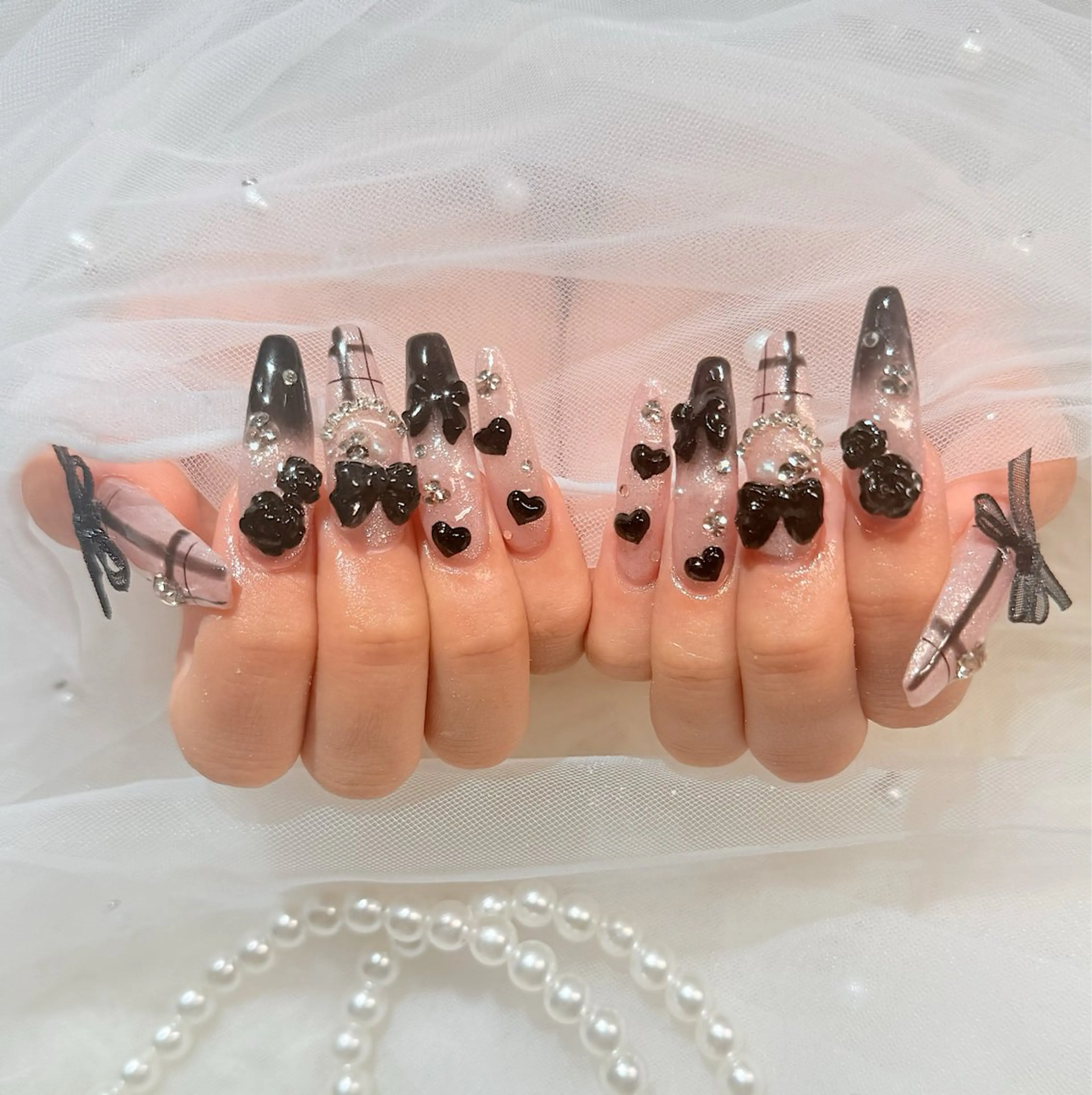 ロング ハンドネイル マシェリローズ所属・Macherie Roseのネイルデザイン