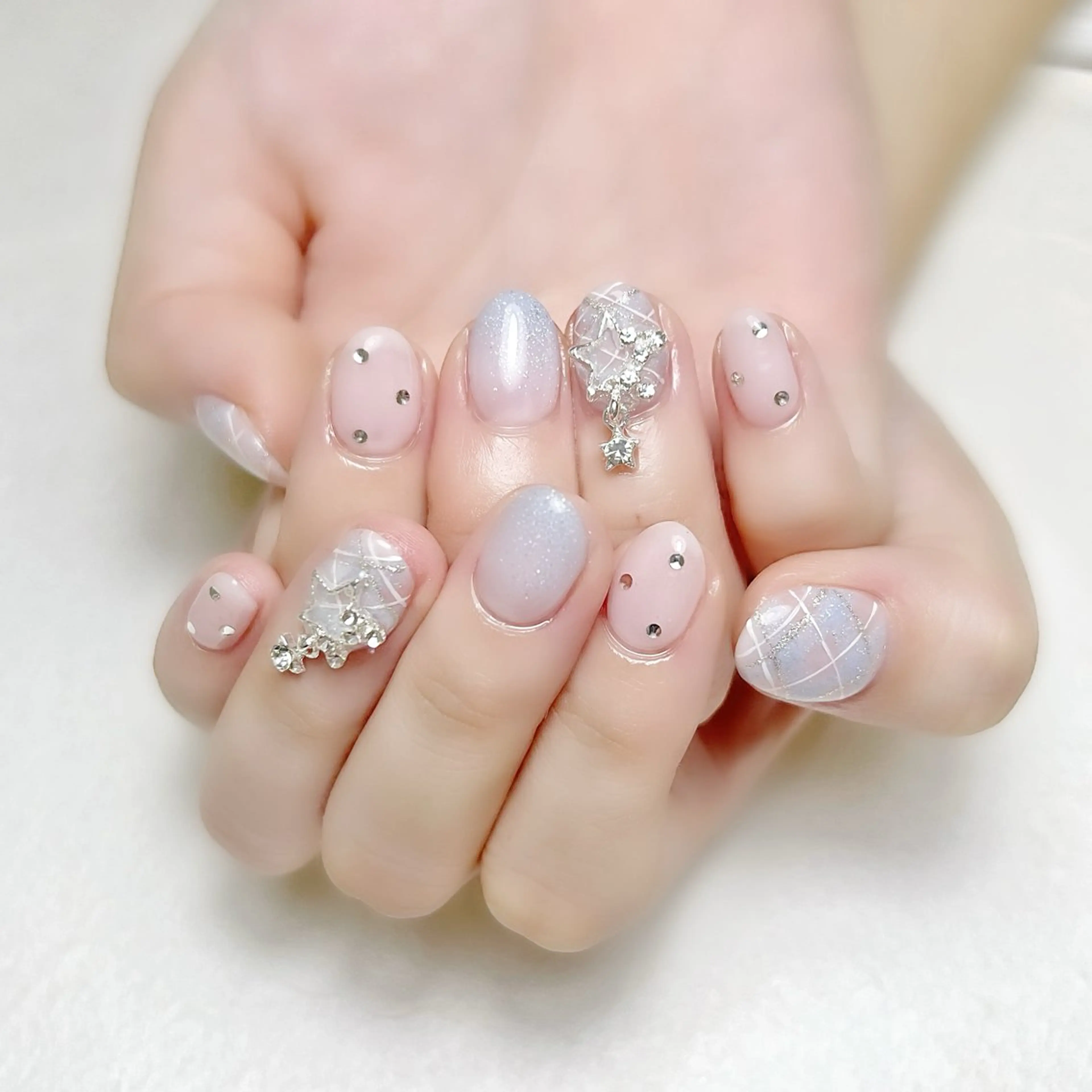 ネイル ブルー グラデーション キラキラネイル リボン 冬ネイル rouse nail RISATOのネイルデザイン