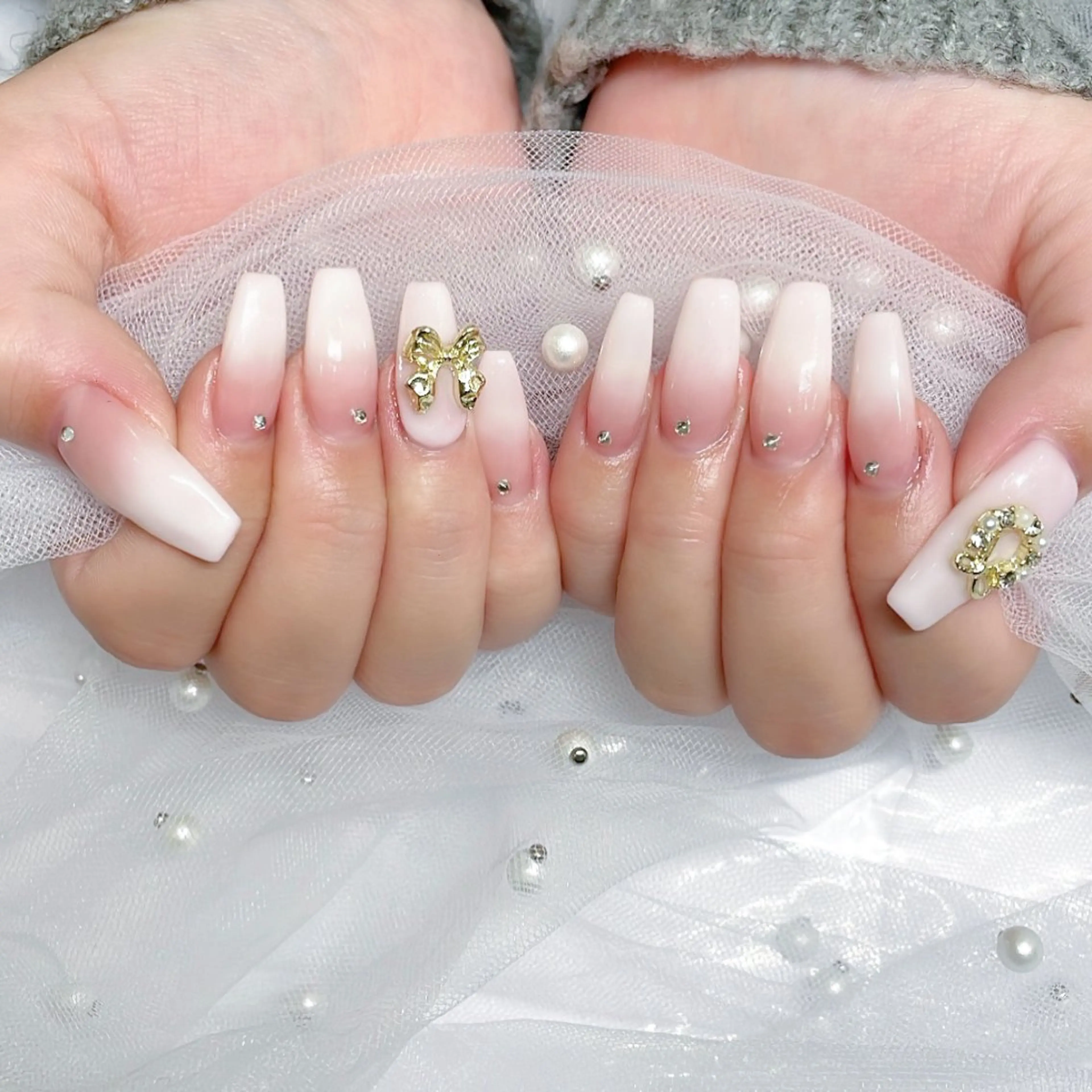 ネイル ハンドネイル misaki 🩰‎🤍🎀のネイルデザイン