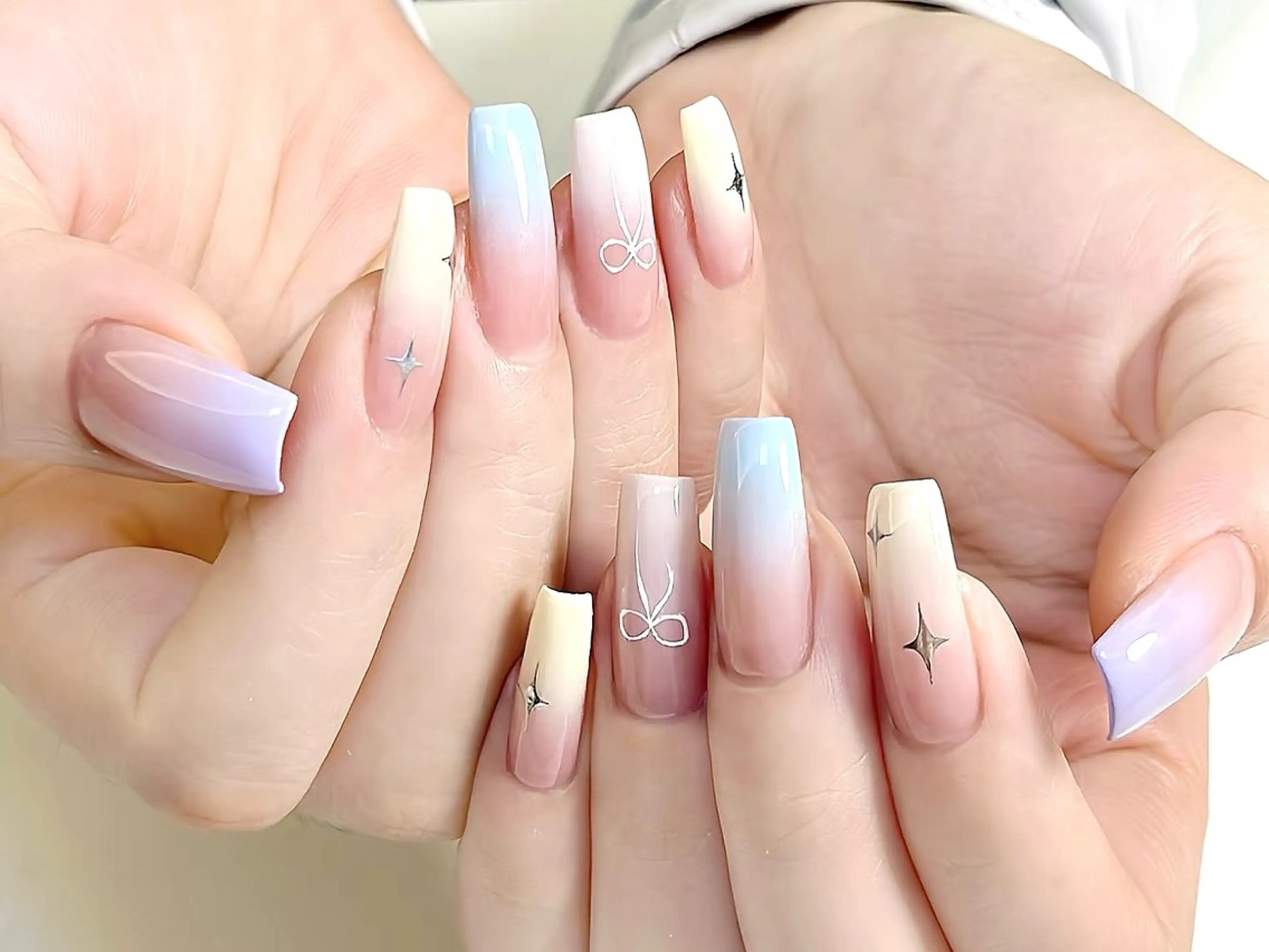 ネイル ブルー クリアネイル グラデーション パステルネイル ピンク ハンドネイル ハンドケア DarkHoney 池袋店のネイルデザイン