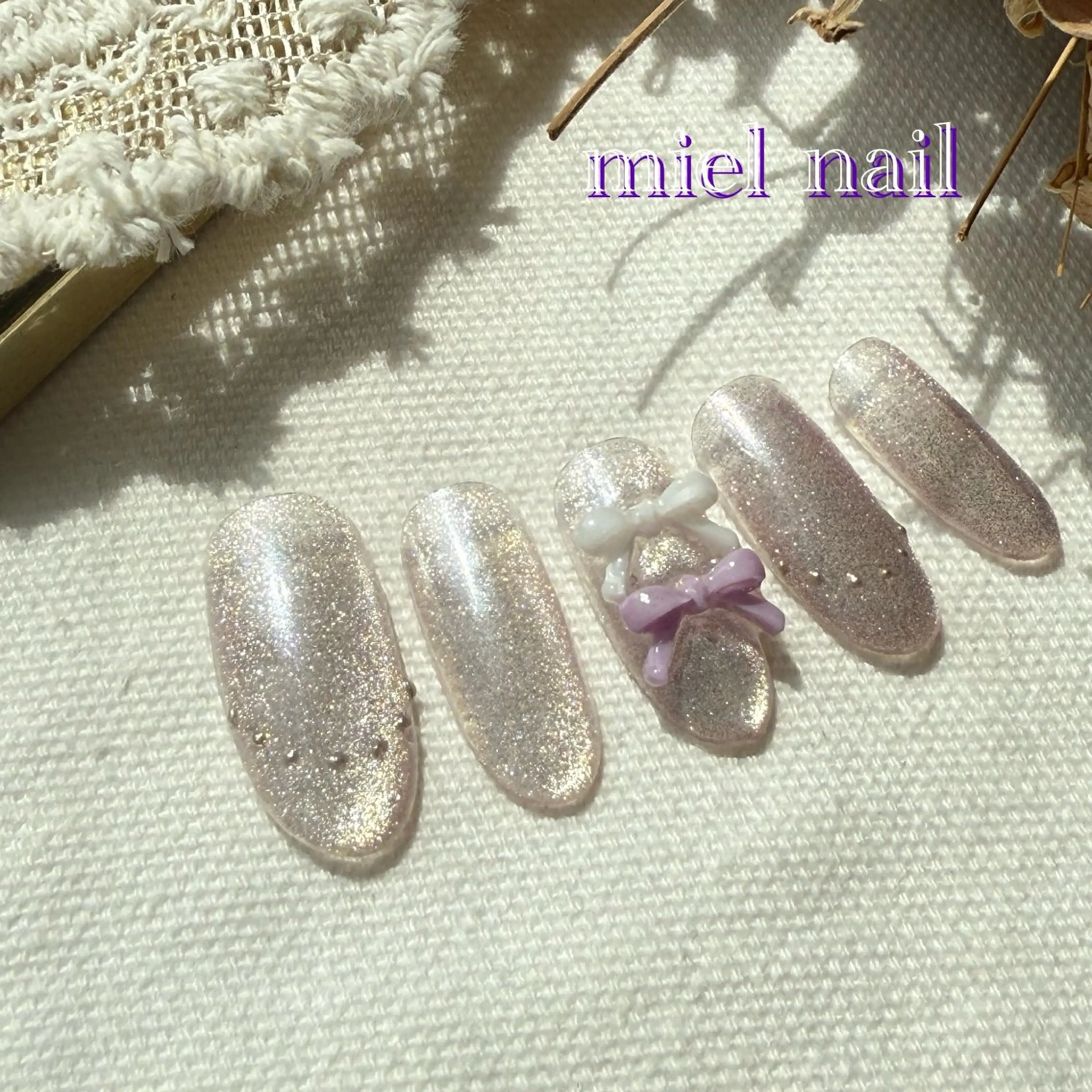 ネイル マグネットネイル パープル リボン 夏ネイル ハンドネイル miel nailのネイルデザイン