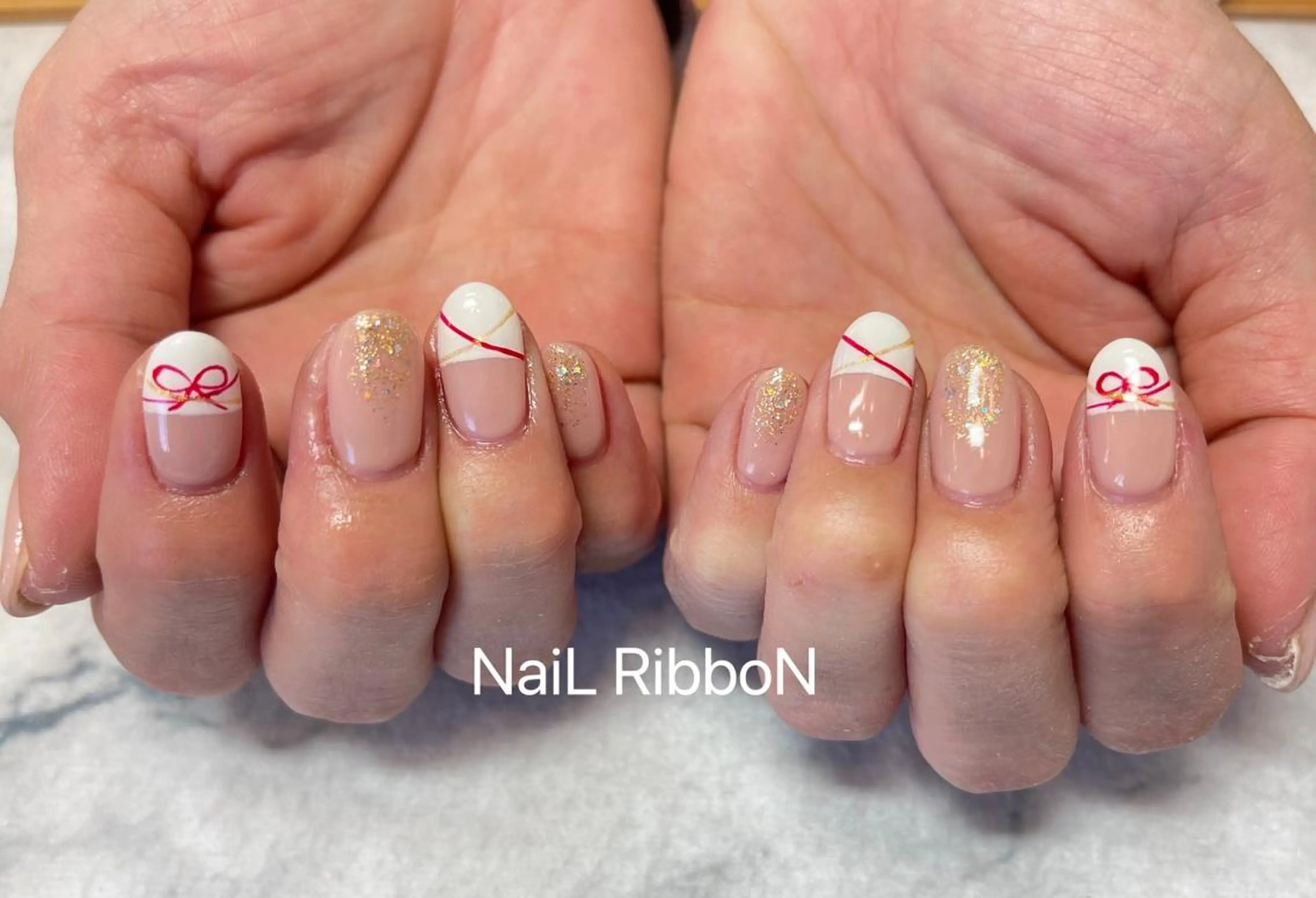 ネイル ネイルリボン 受付スタッフのネイルデザイン