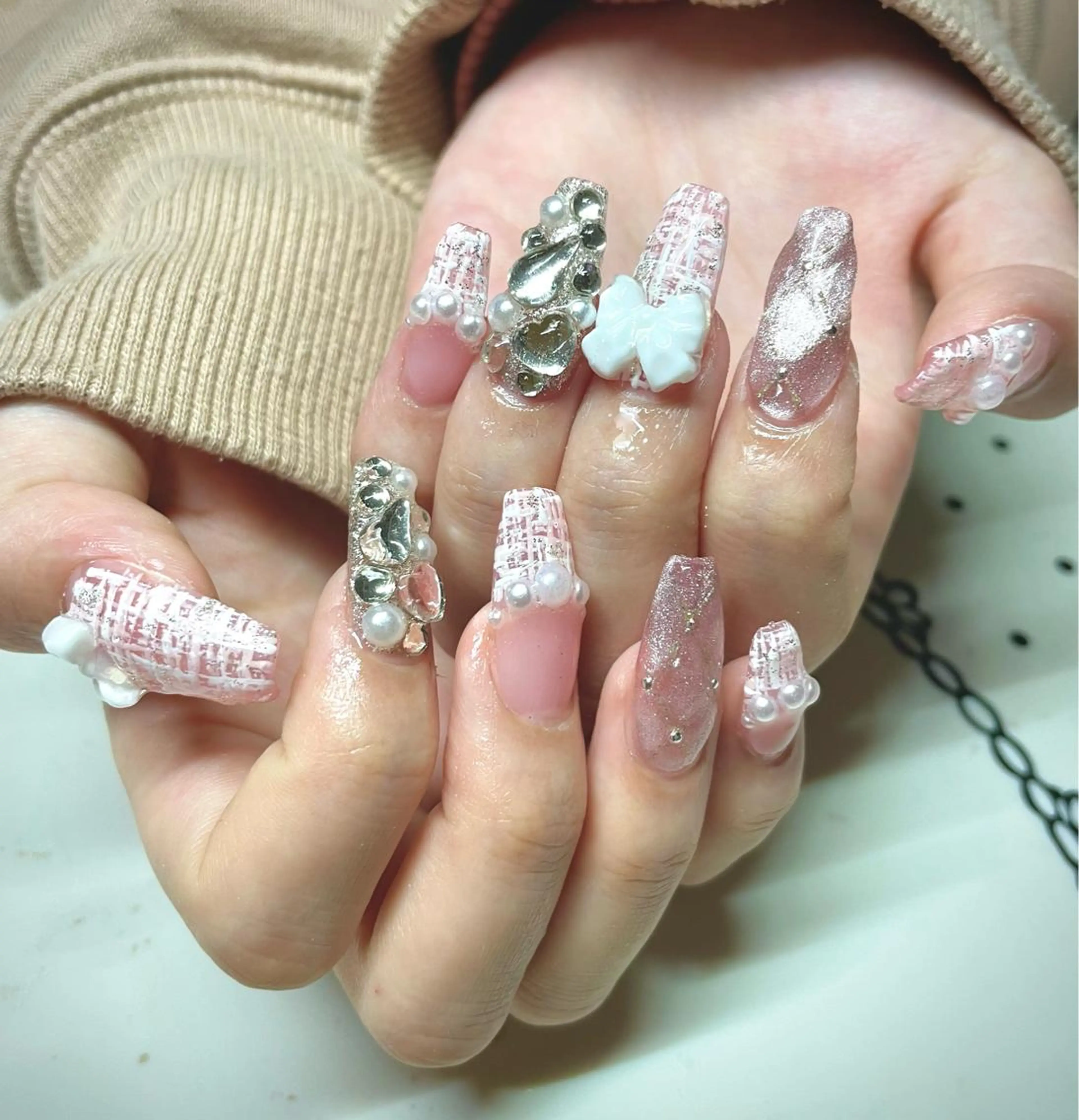 ネイル リボン ハンドネイル nailsalon sugarr所属・nailist cocoのネイルデザイン