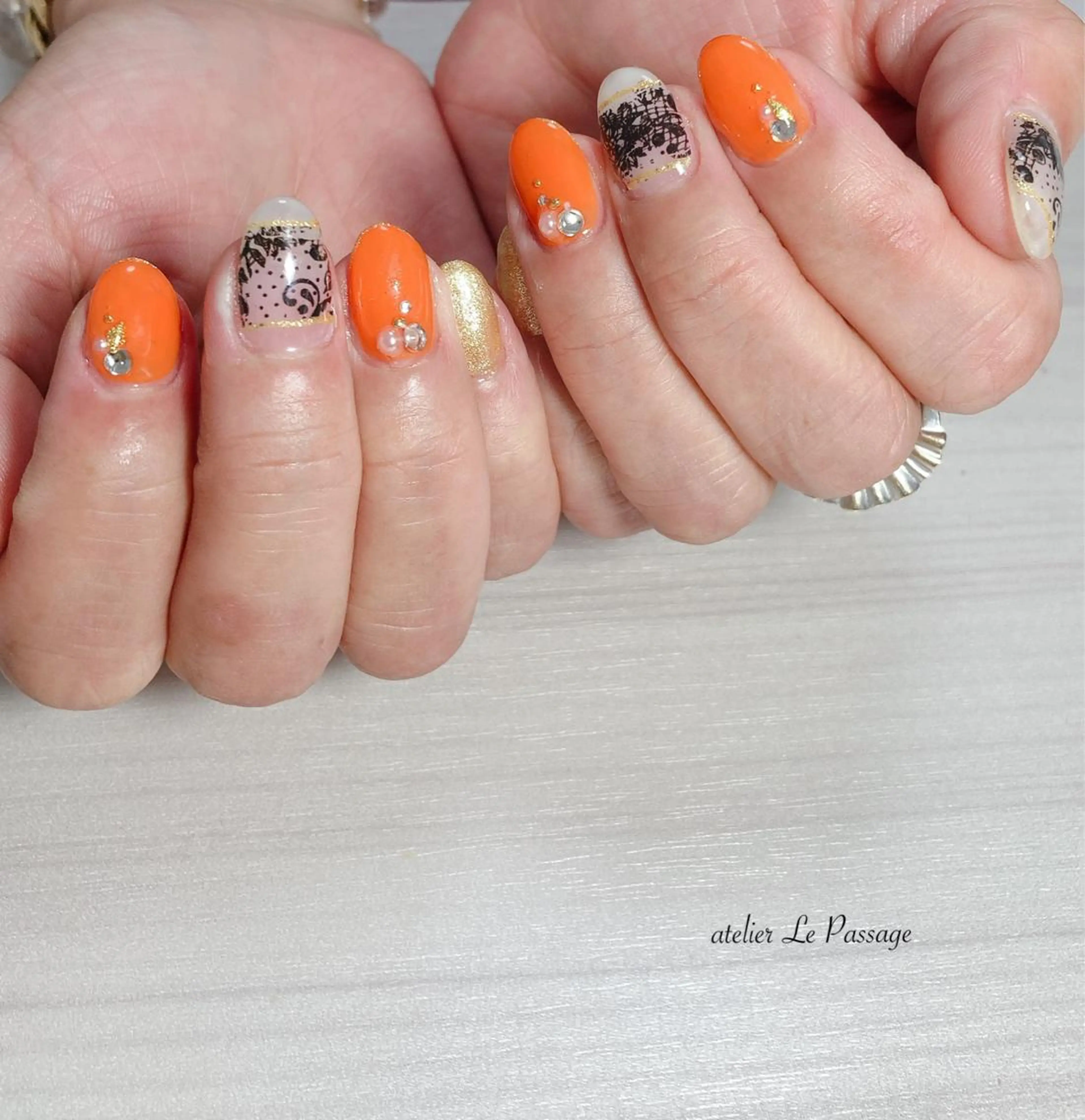 ネイル ジェルネイル レース オフィスネイル オレンジ パラジェル Atelier Le Passage所属・h nakatsukaのネイルデザイン
