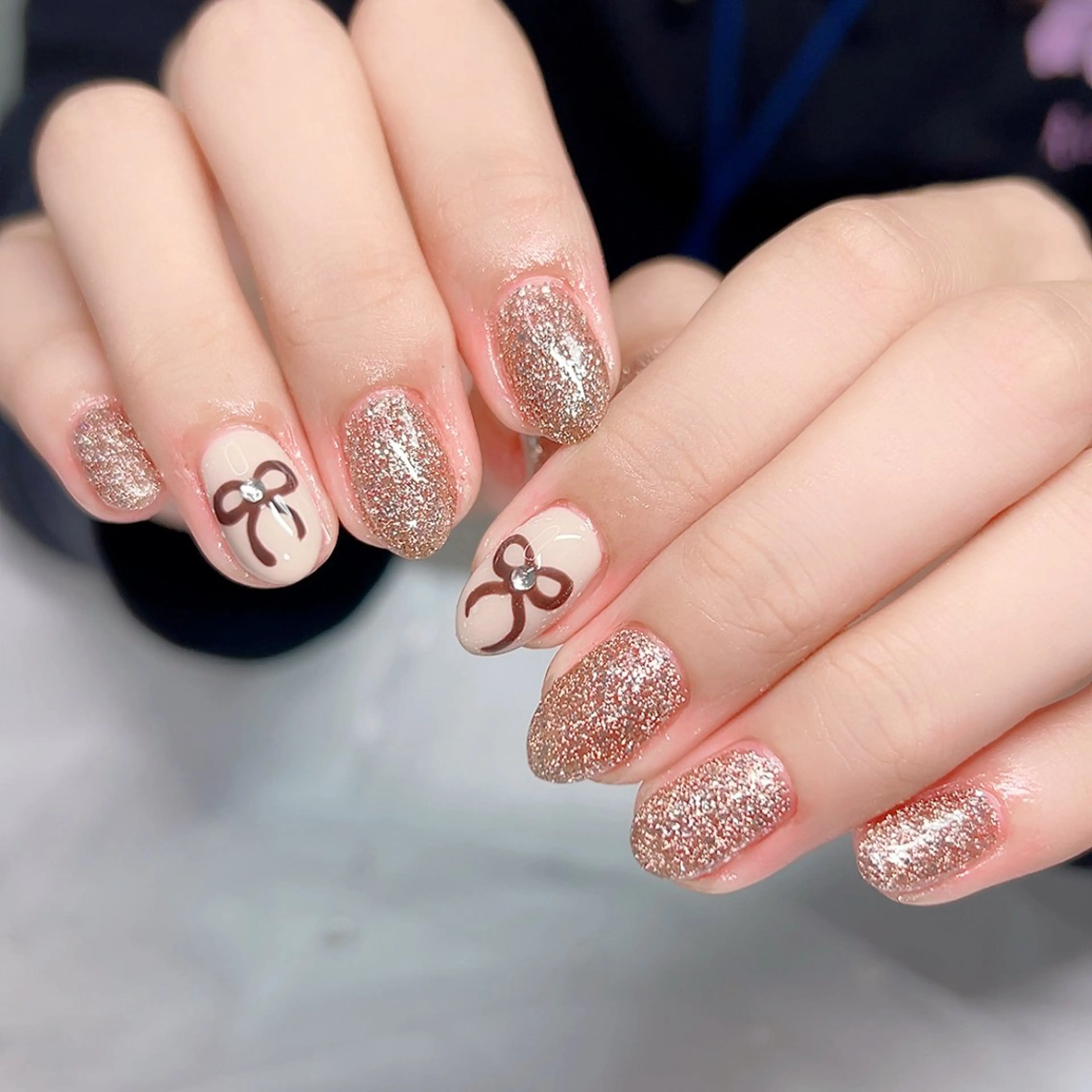 ネイル ブラウン ジェルネイル キラキラネイル リボン シンプルネイル ハンドネイル Cute Tips nailのネイルデザイン