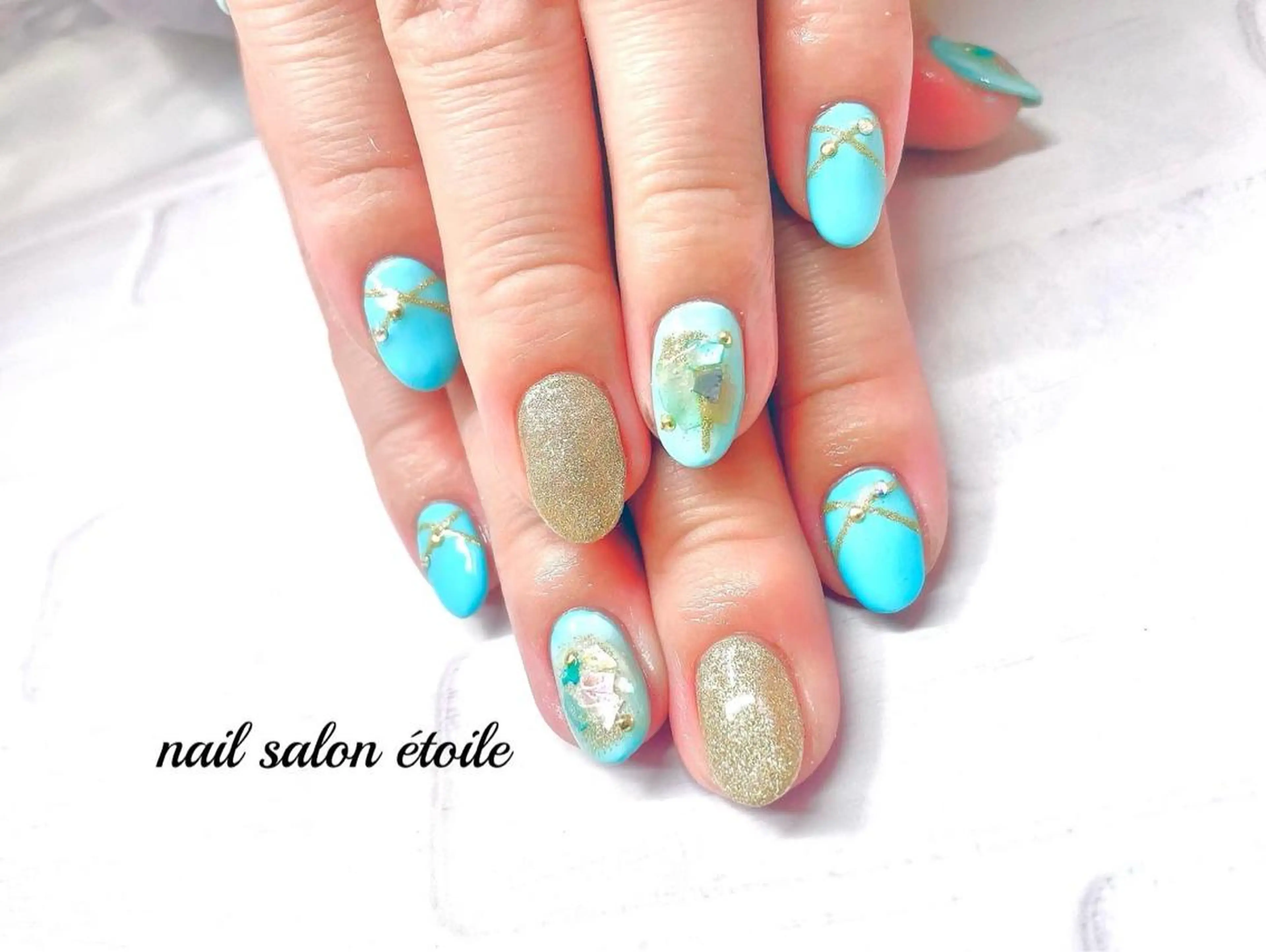 ネイル ジェルネイル グリーン ラメ(グリッター) 水色 ハンドネイル nail salon étoileのネイルデザイン