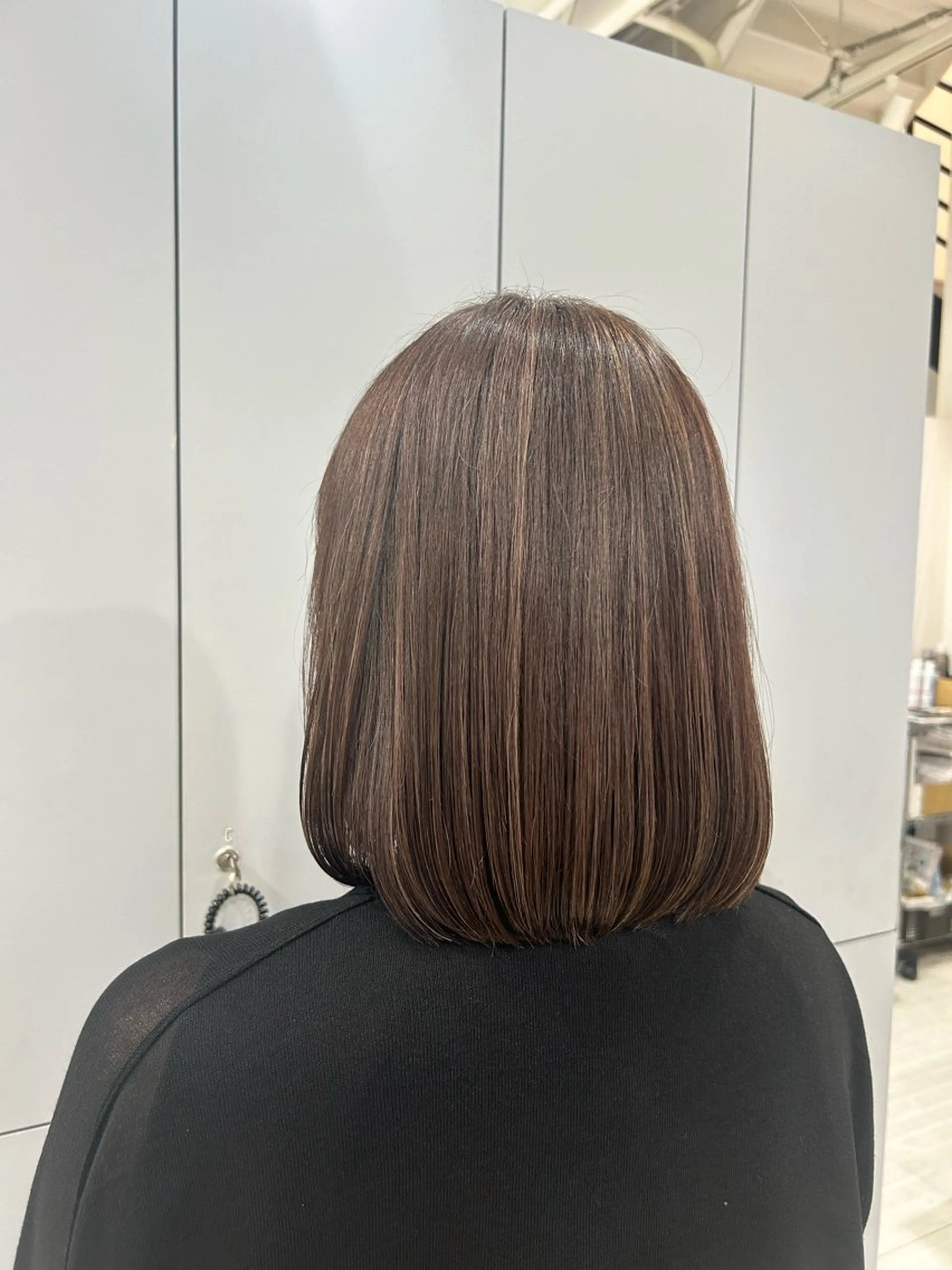 ミディアム カラー KANA .のヘアスタイル