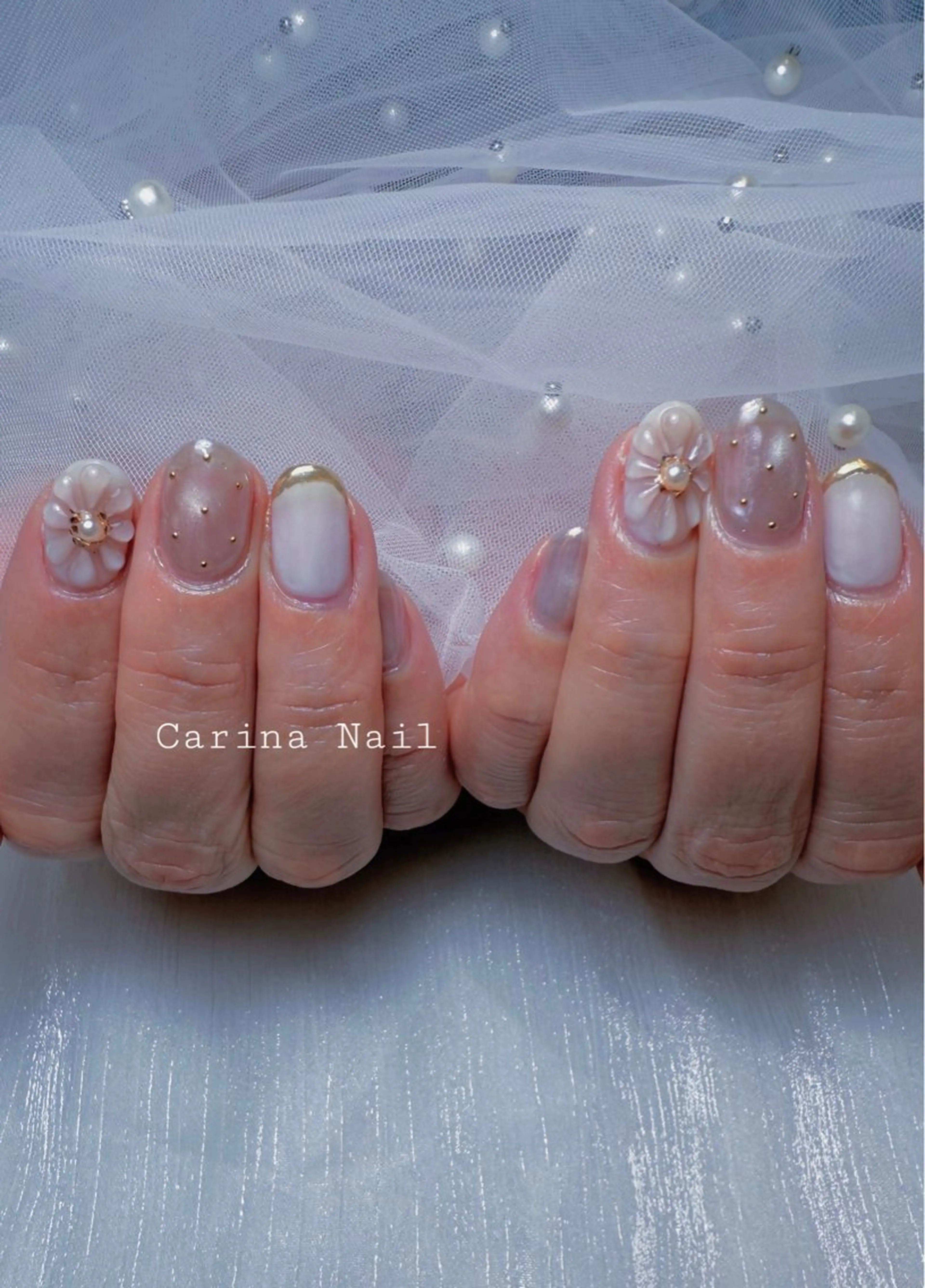 ネイル フラワーネイル ゴールド Carina Nail所属・Carina Nailのネイルデザイン