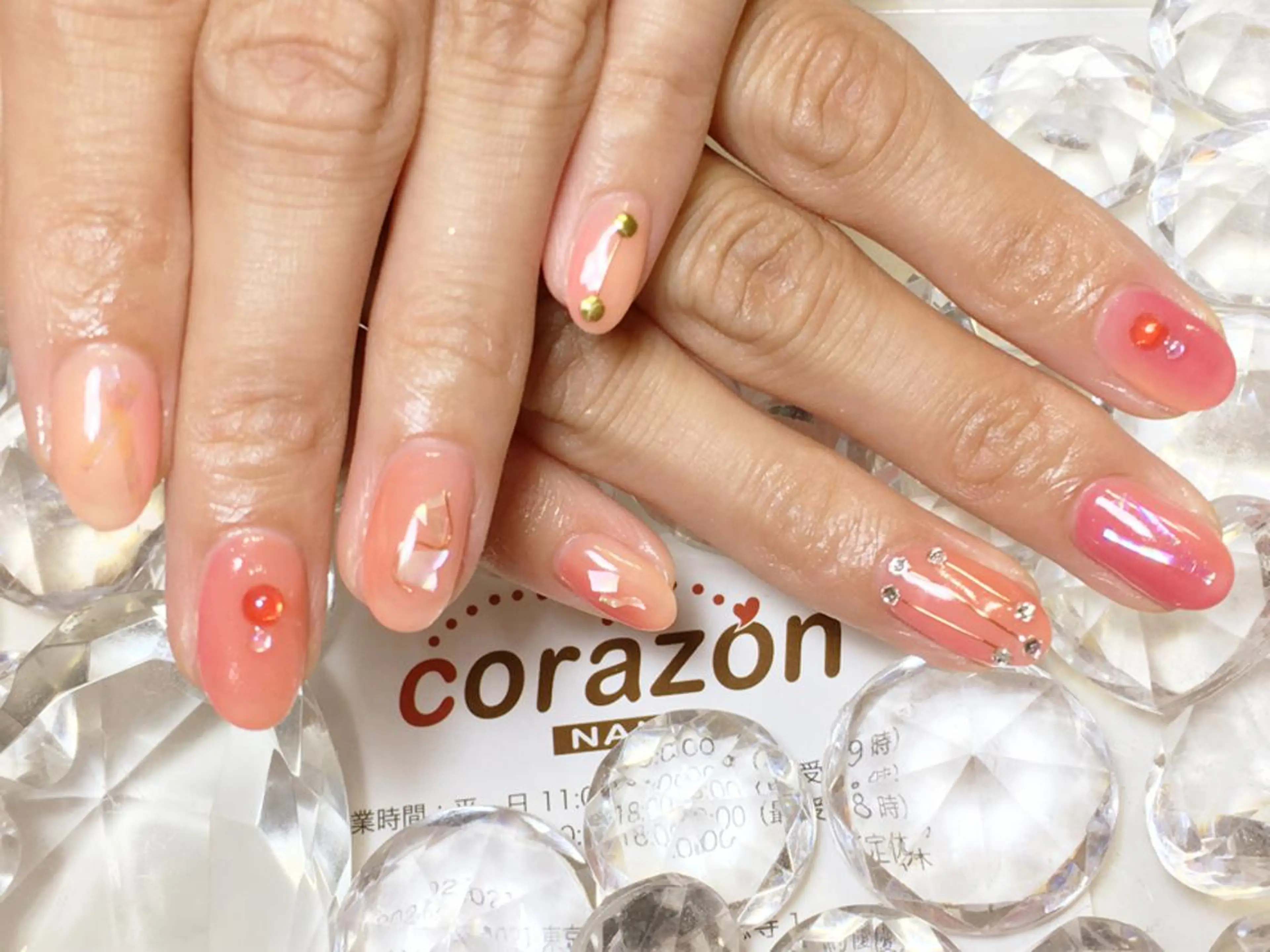 ネイル アートネイル オレンジ ピンク corazon所属・ネイリスト aicoのネイルデザイン