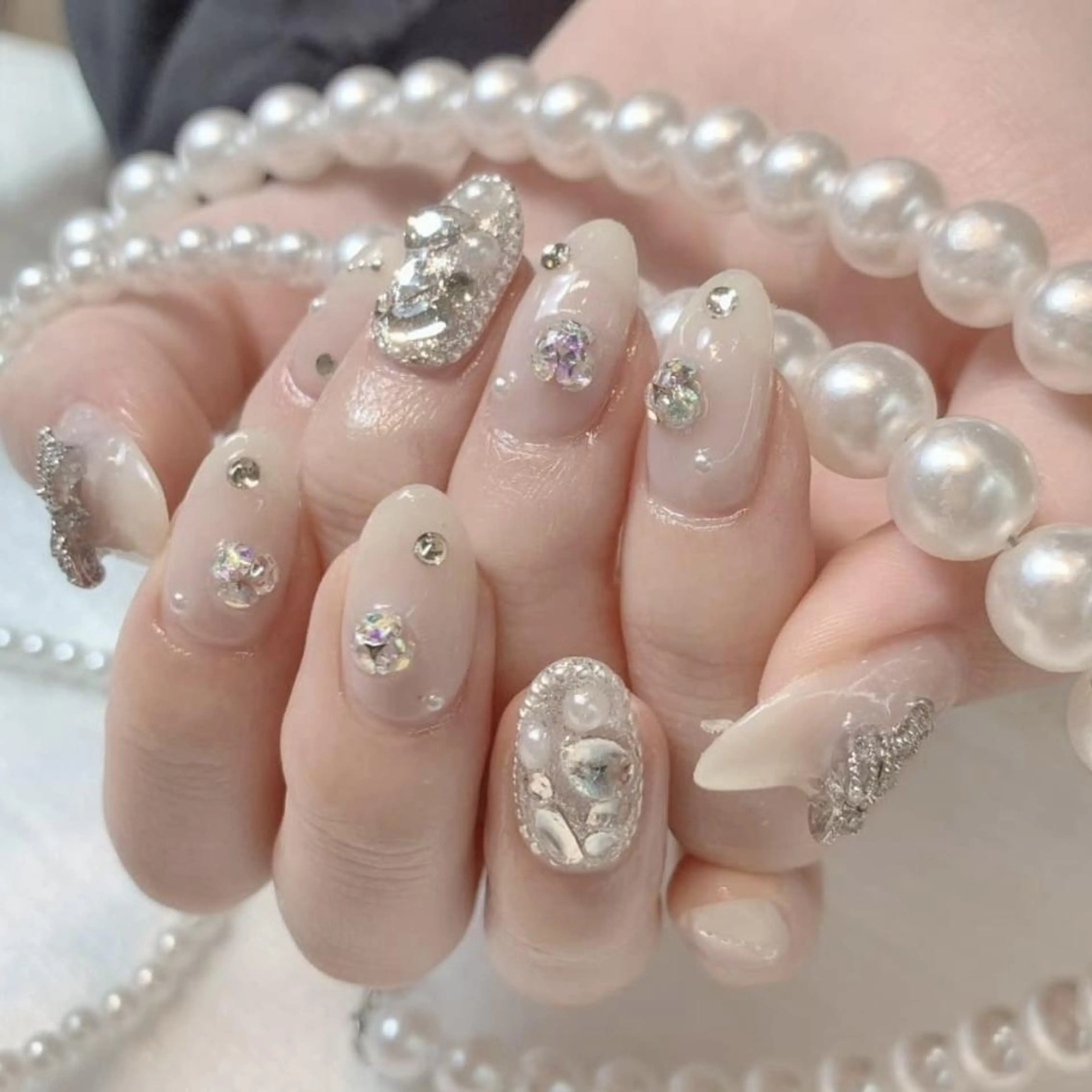 ネイル RAFFINE 月🦋🩵のネイルデザイン