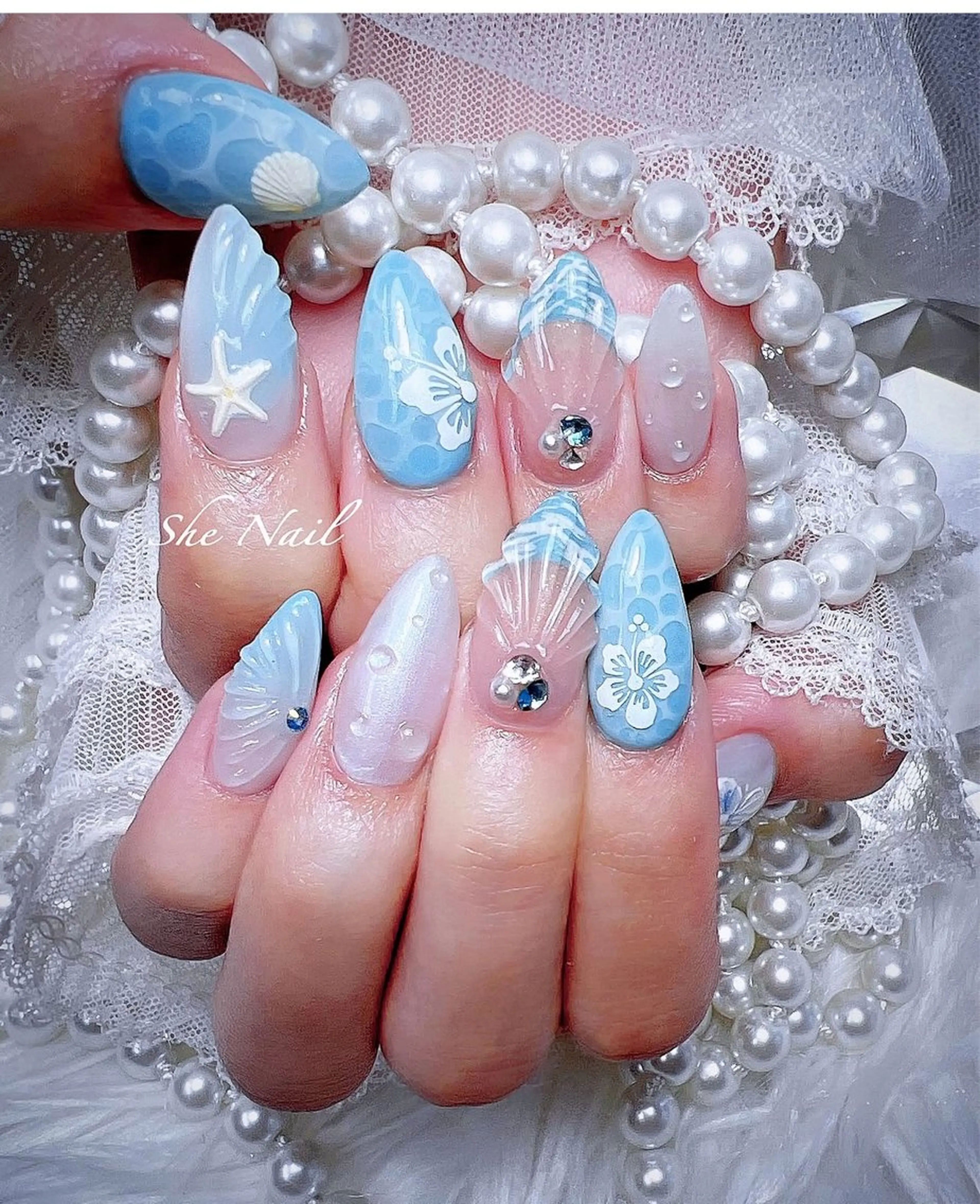 ネイル チークネイル 長さ出し フレンチネイル 水色 マグネットネイル She   Nail所属・ISA_ BELLAのネイルデザイン