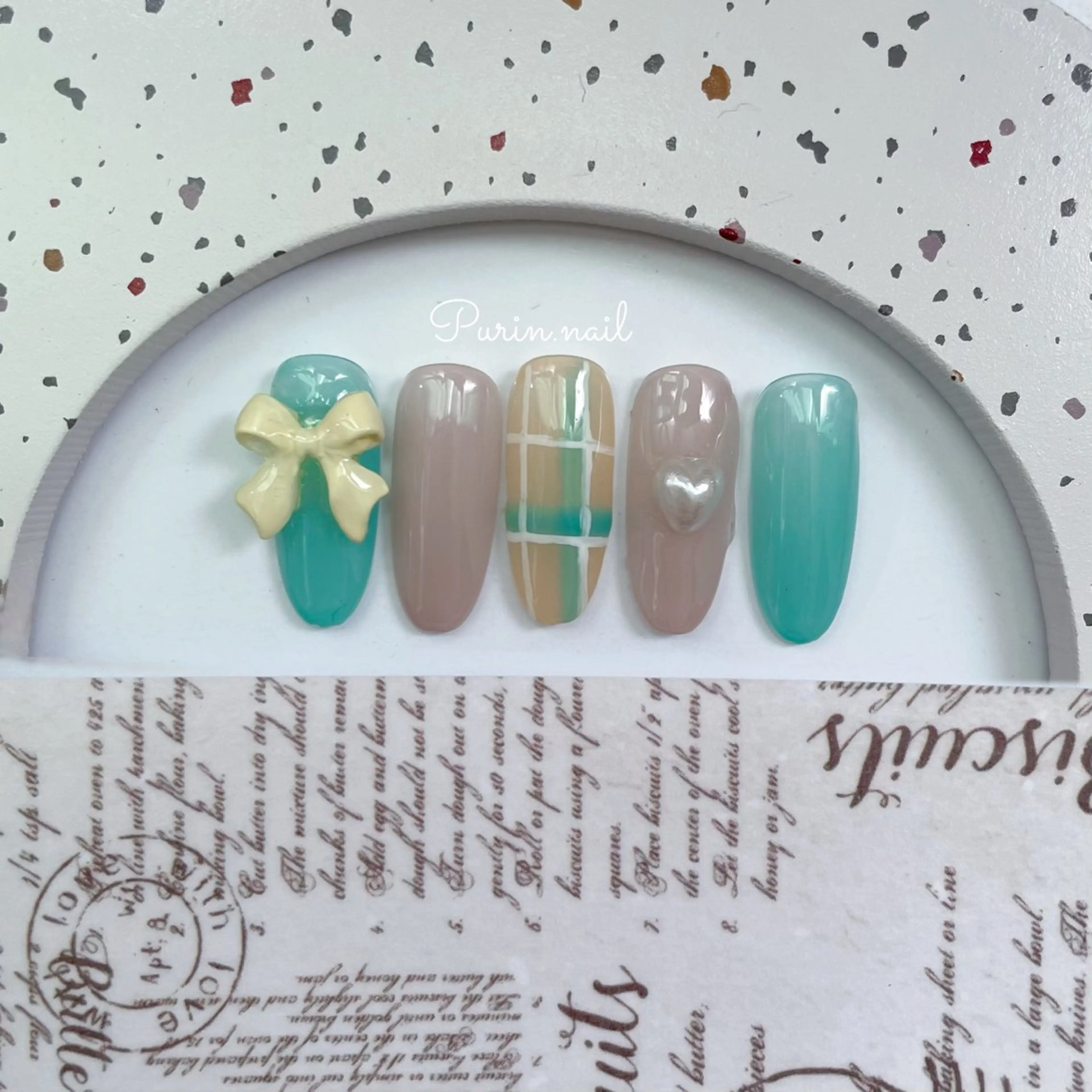 ネイル リボン Nails by Purin🍮のネイルデザイン