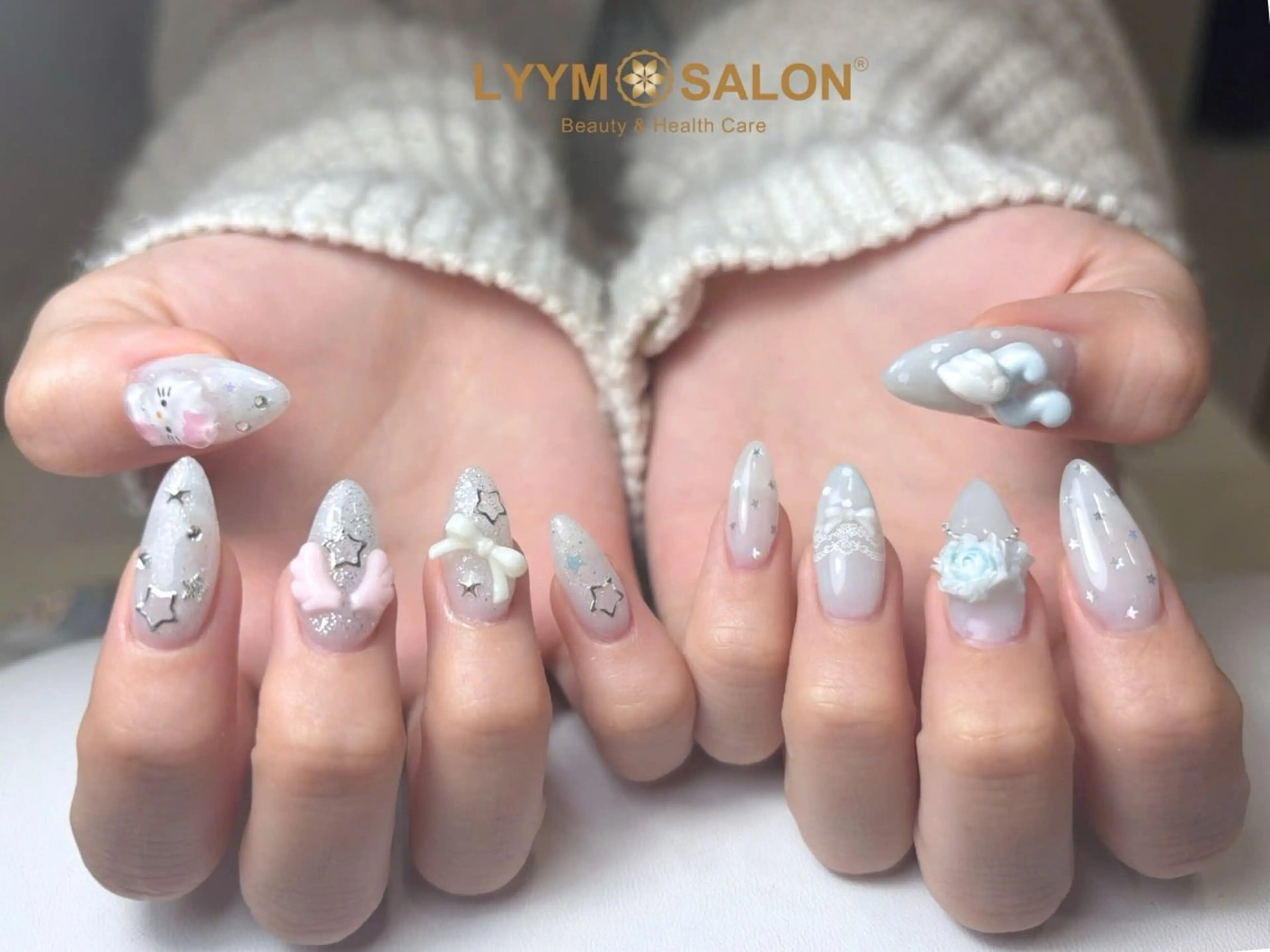 ネイル パステルネイル リボン ハンドネイル LYYM Salonのネイルデザイン