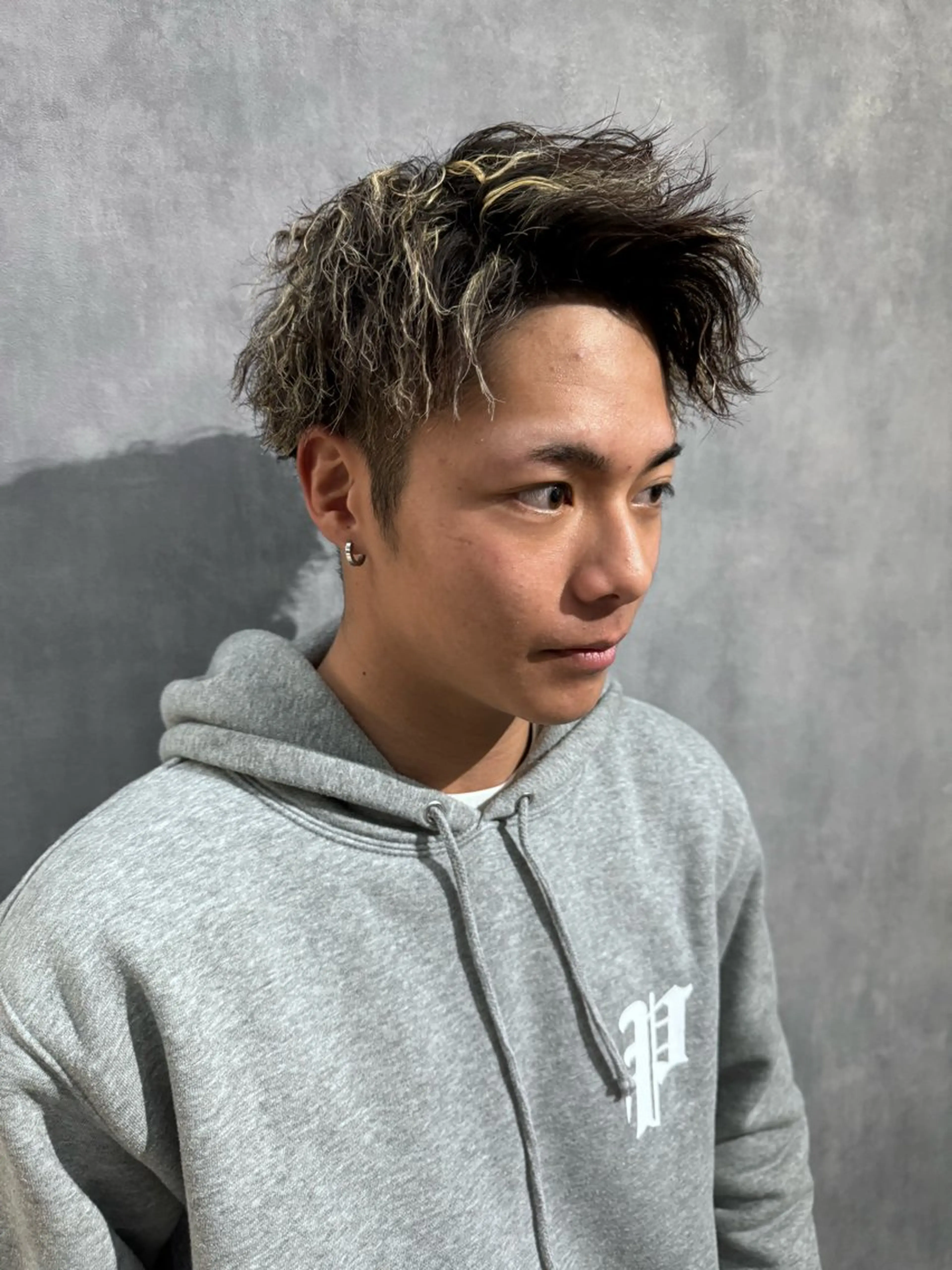 カット+ツイストスパイラルパーマの写真