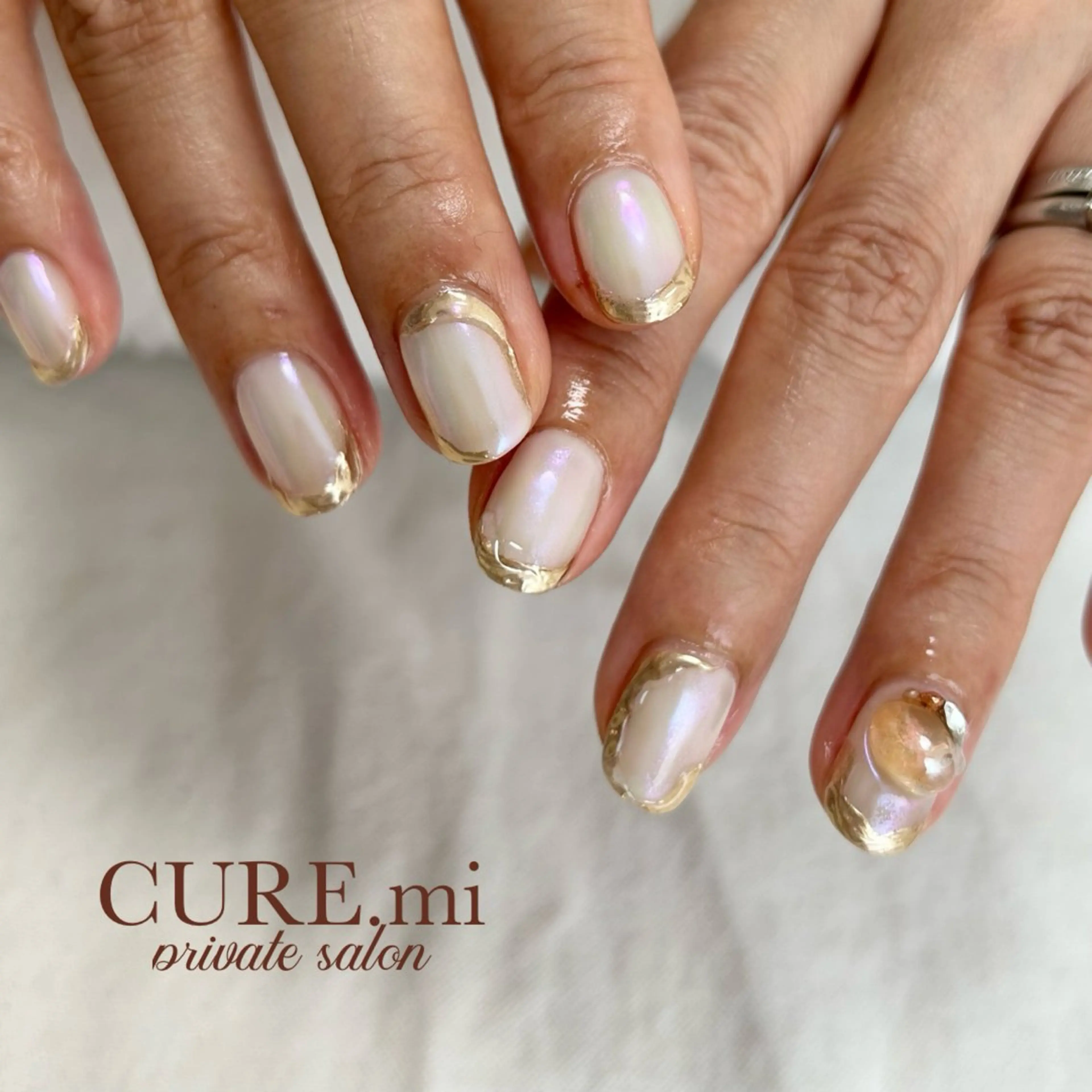 ネイル オーロラネイル キラキラネイル ミラーネイル 春ネイル 夏ネイル ハンドネイル ハンドケア 伊藤 美香のその他イメージ