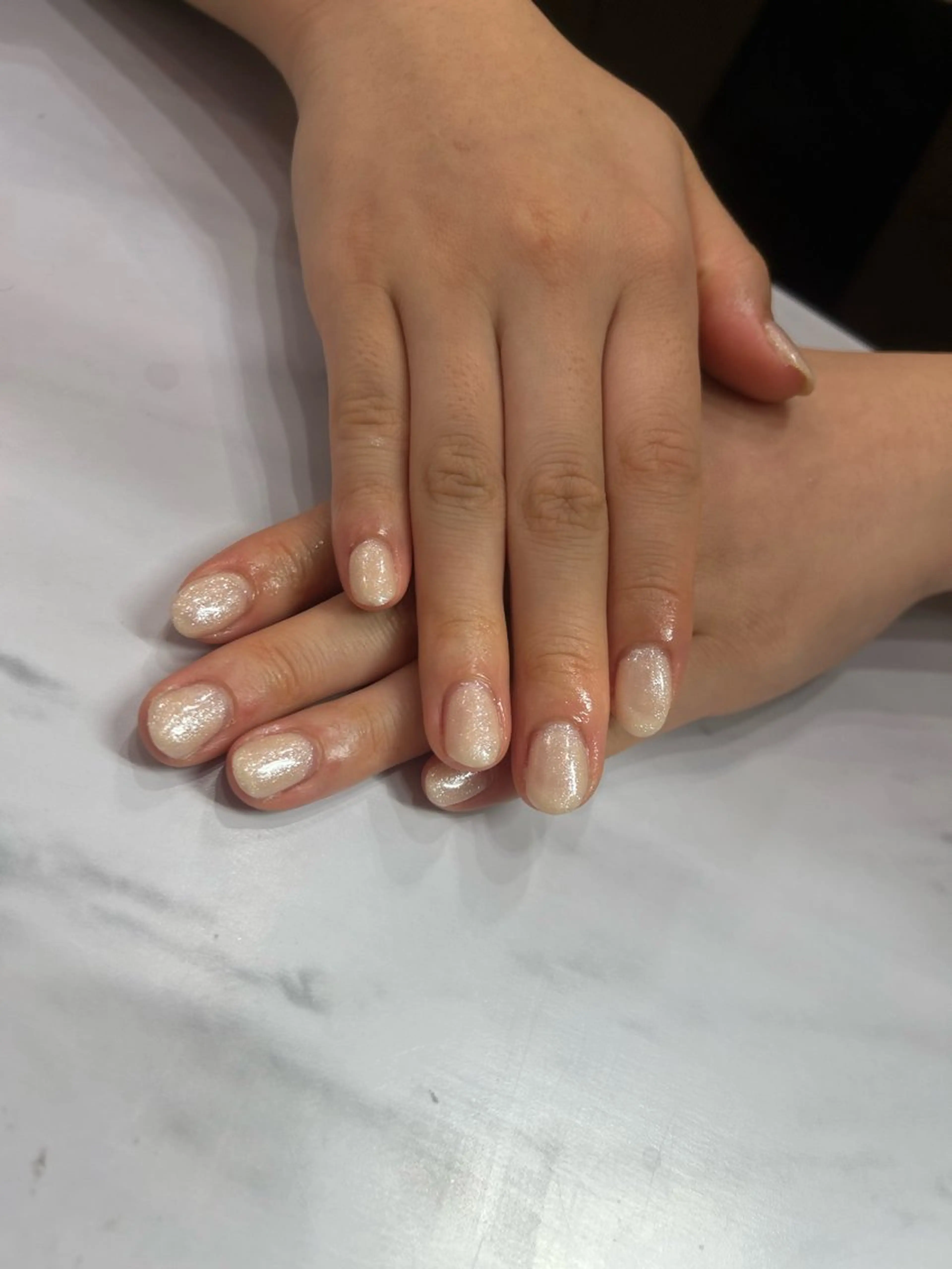 ネイル ラメ(グリッター) ワンカラーネイル ホワイト ネイルサロンエーナインイオンモール苗穂店所属・N. kurumiのネイルデザイン