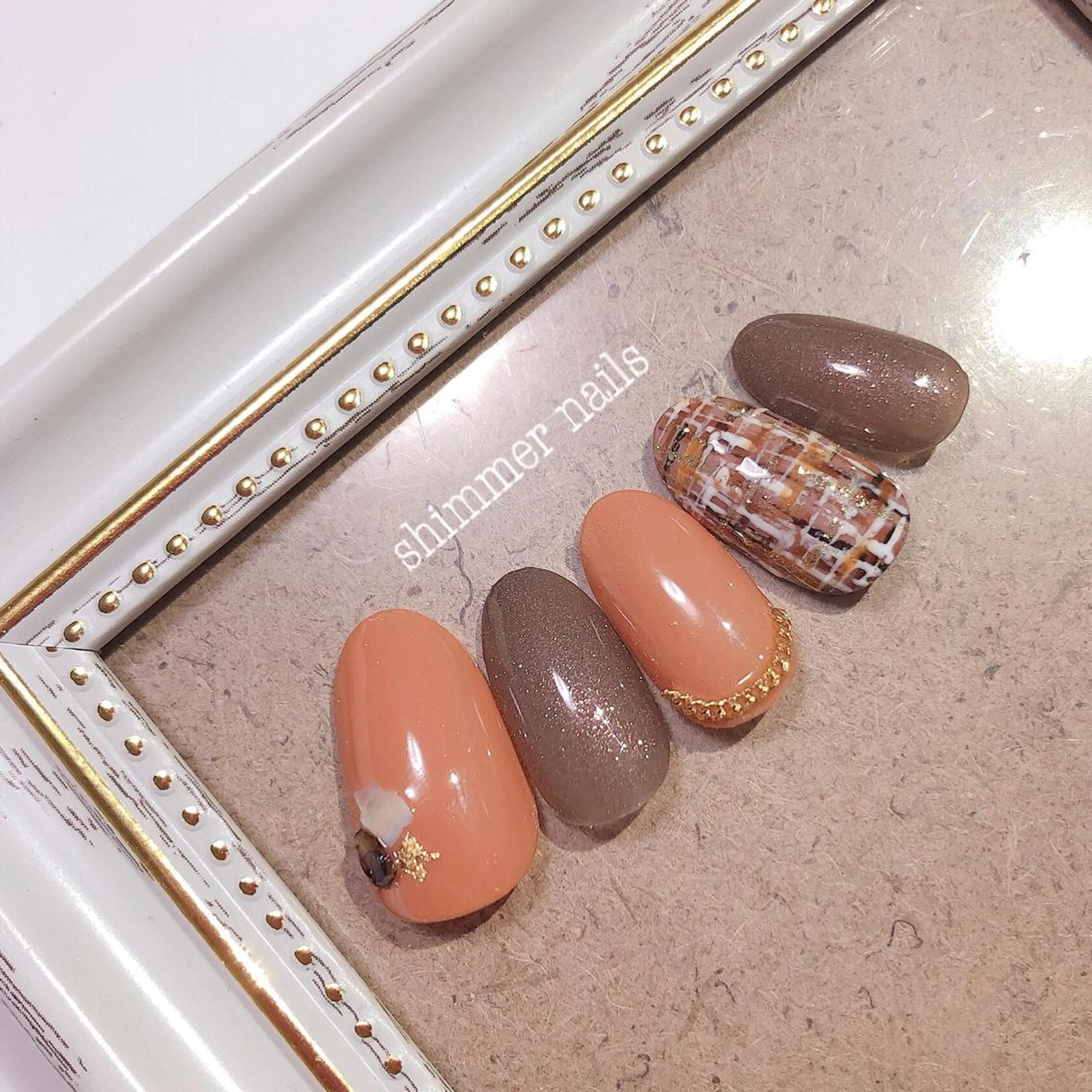 ネイル ブラウン オレンジ shimmer nailsのネイルデザイン