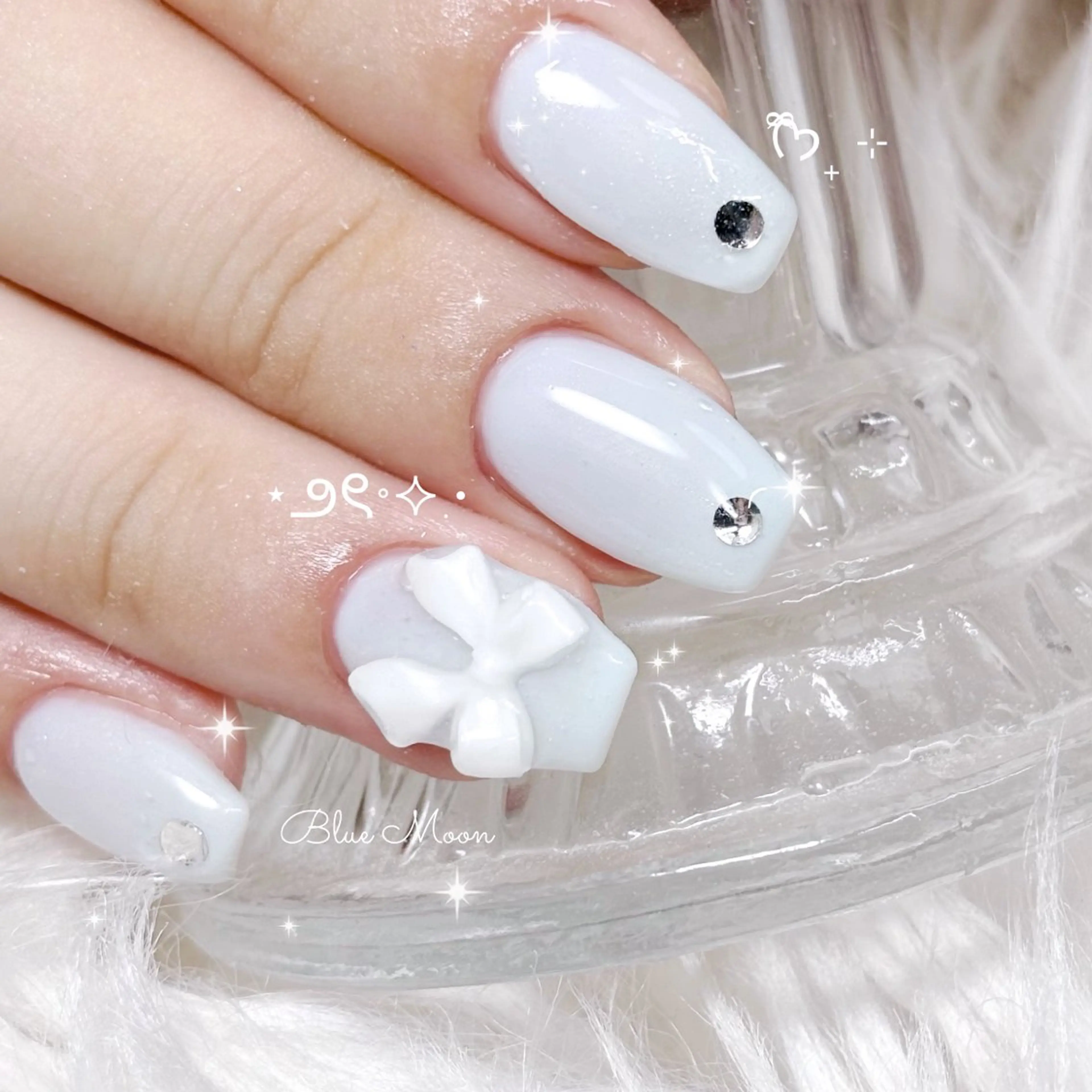 ネイル リボン ストーンネイル ハンドネイル フットネイル ハンドケア nail salon Blue Moonのネイルデザイン