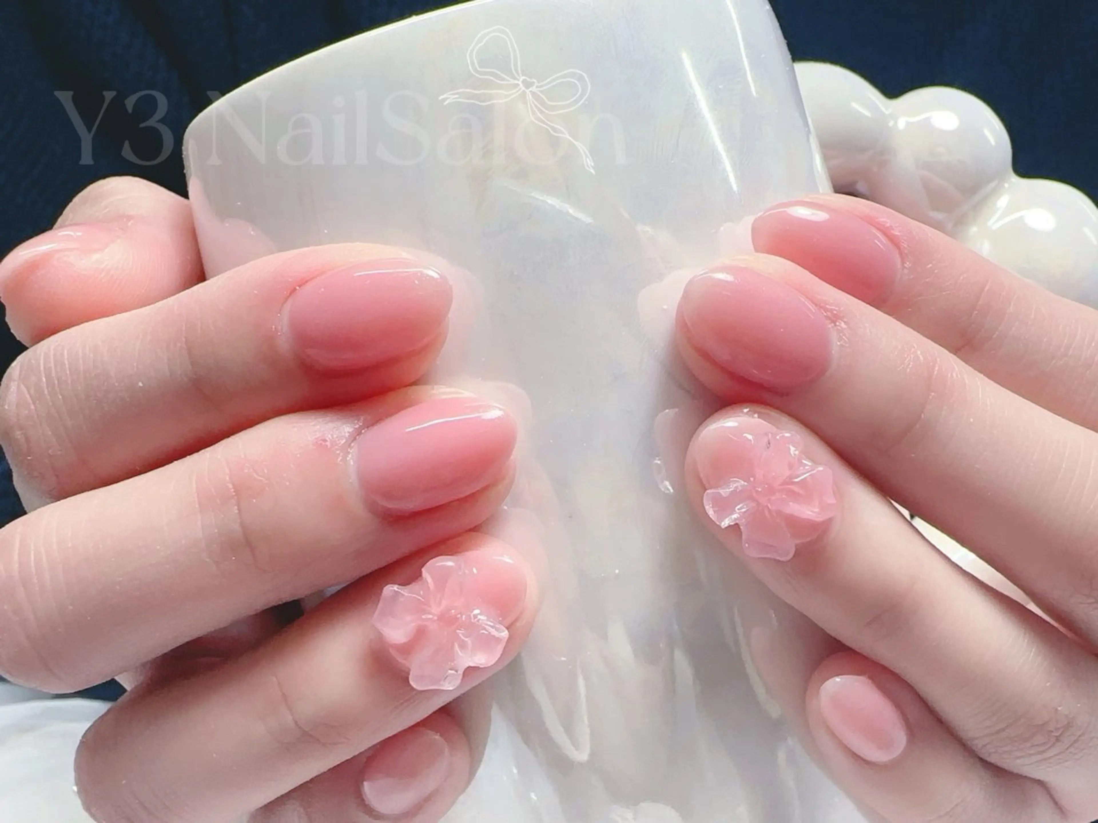 ネイル クリアネイル ワンカラーネイル ピンク リボン 春ネイル ハンドネイル Y3 Nail Salon所属・Y3 NailSalonのネイルデザイン