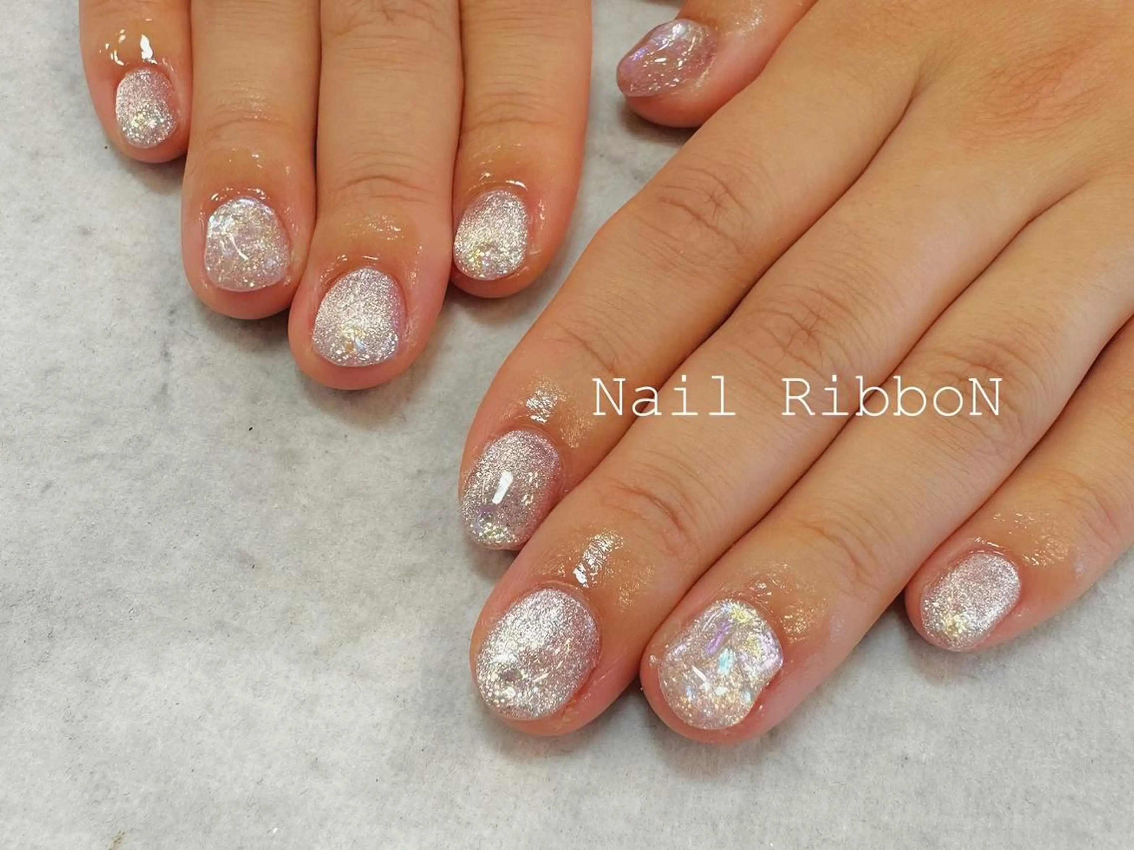 ネイル ネイルリボン 受付スタッフのネイルデザイン