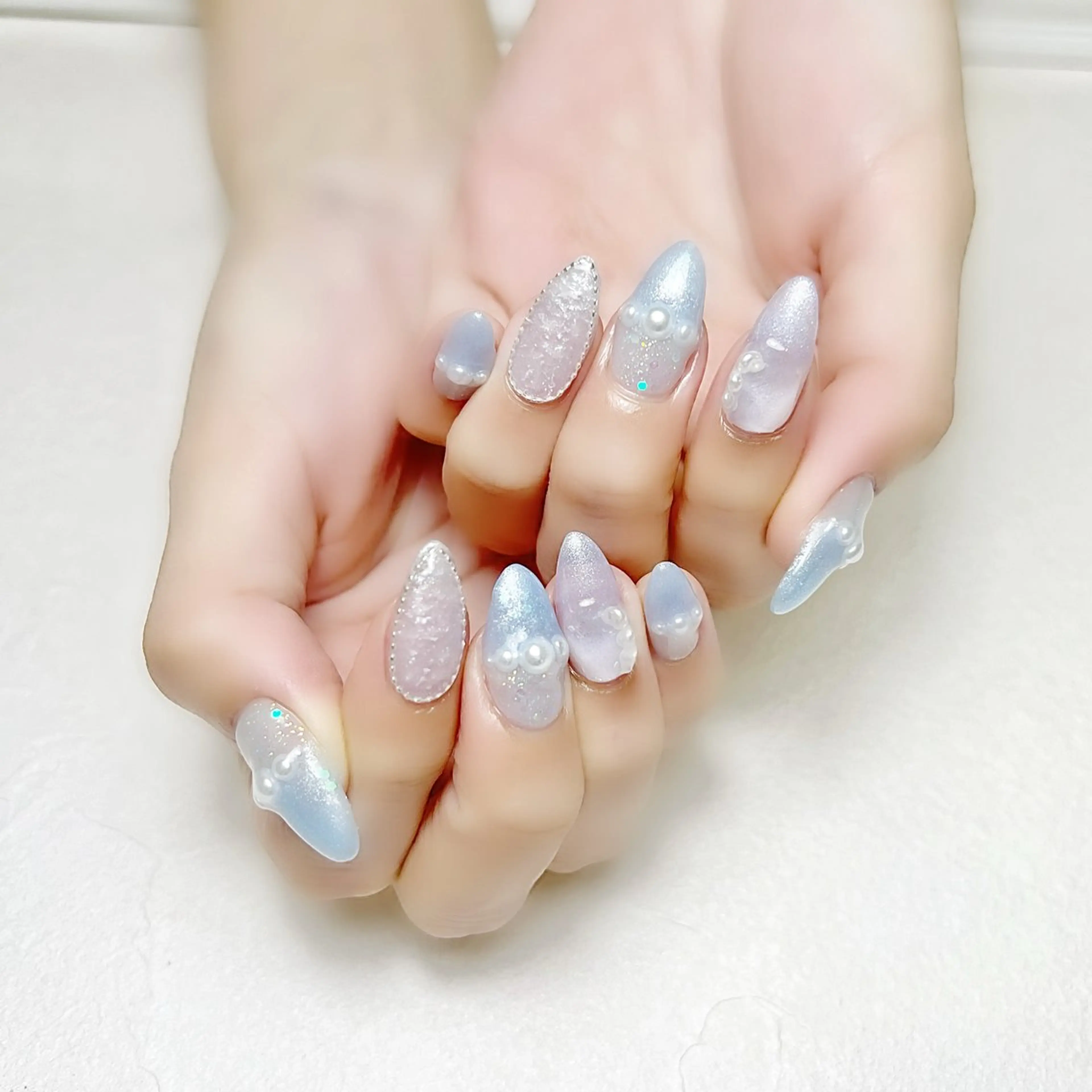 ネイル ガーリー 氷ネイル・うるうるネイル キラキラネイル 水色 夏ネイル rouse nail RISATOのネイルデザイン