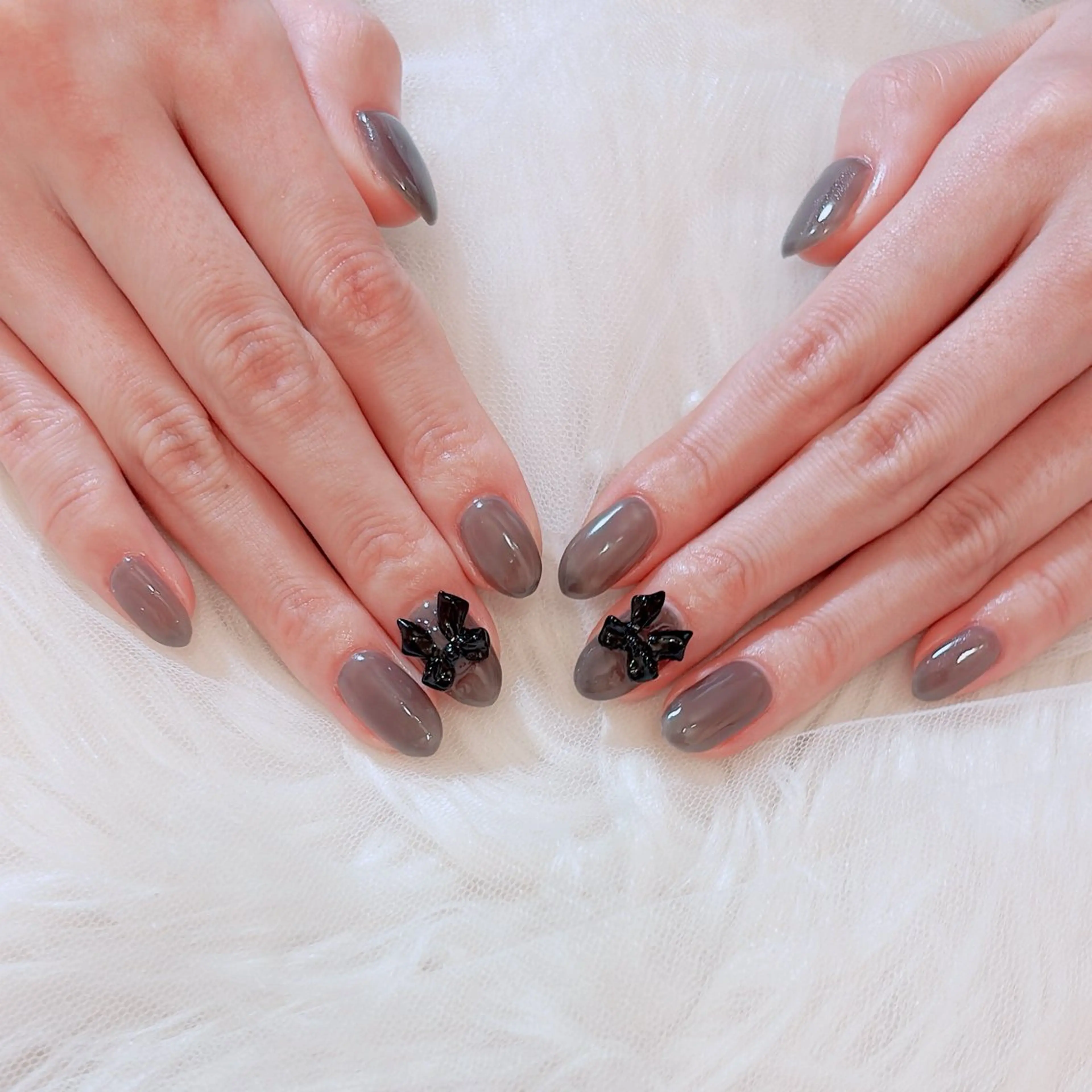 ネイル ワンカラーネイル リボン Bloom Nail Salonのネイルデザイン