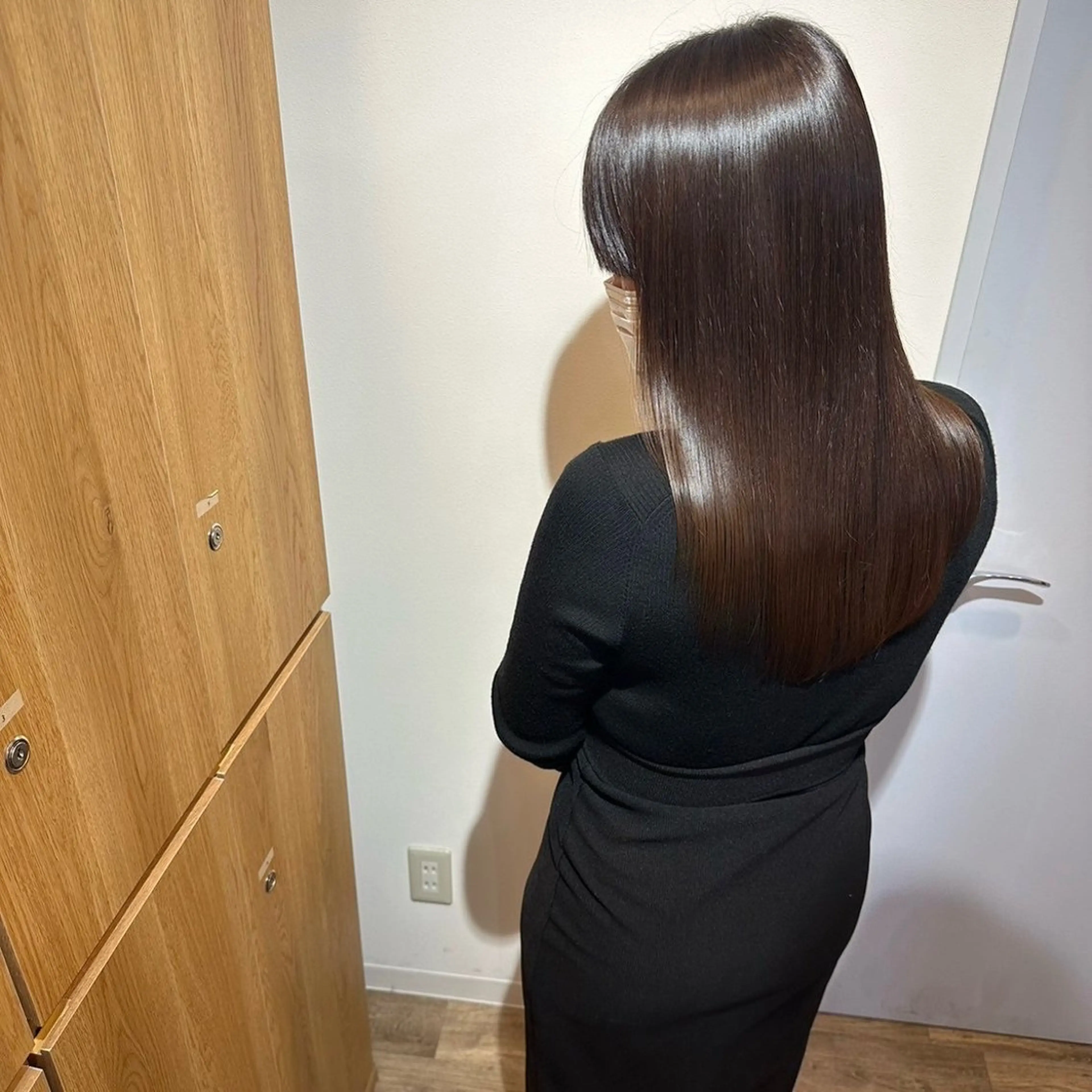 ロング 岡田 佳子のヘアスタイル