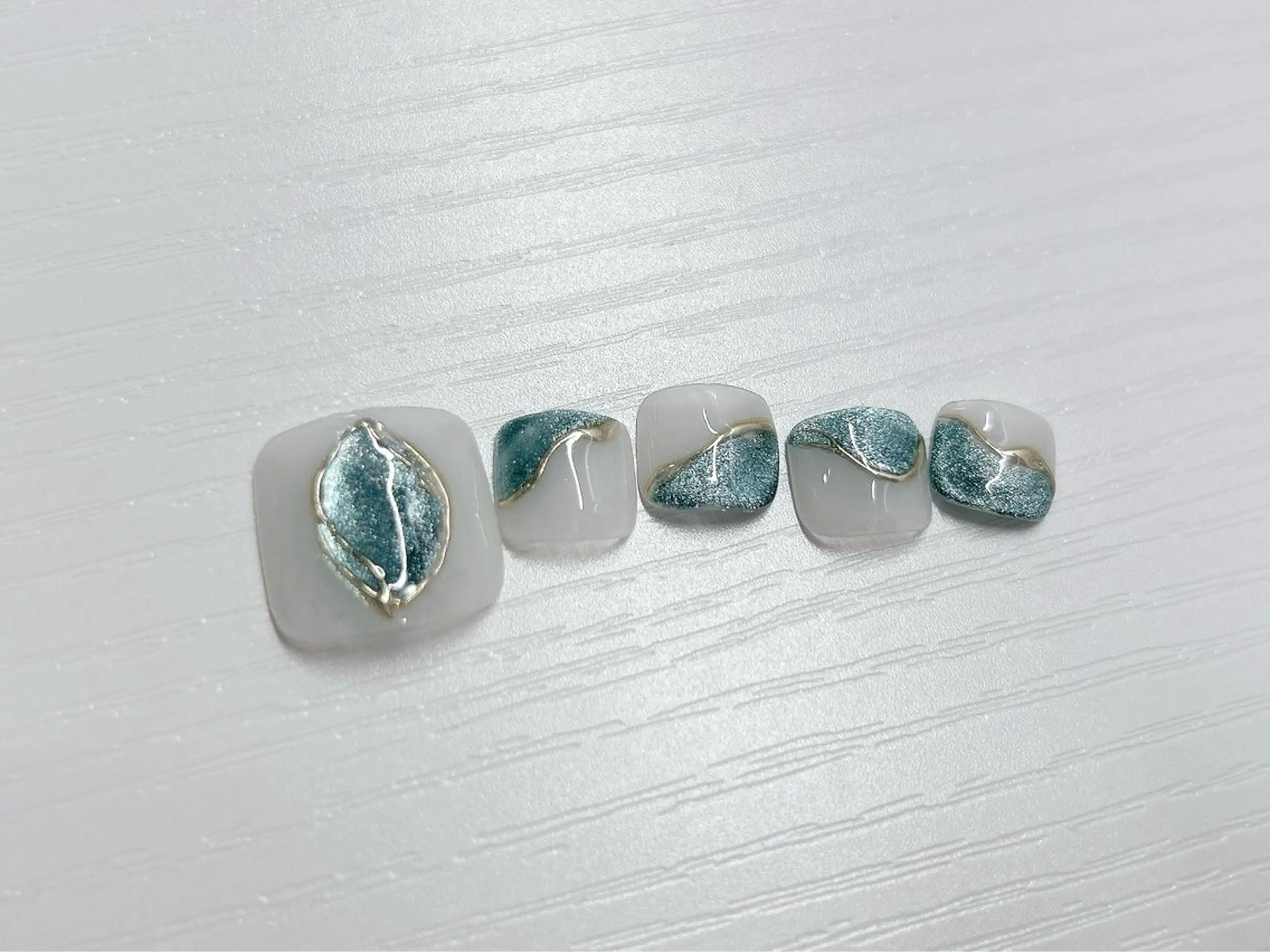 ネイル アートネイル ブルー 桜ネイル マグネットネイル ミラーネイル フットネイル Forca total studio所属・Forca Airaのネイルデザイン