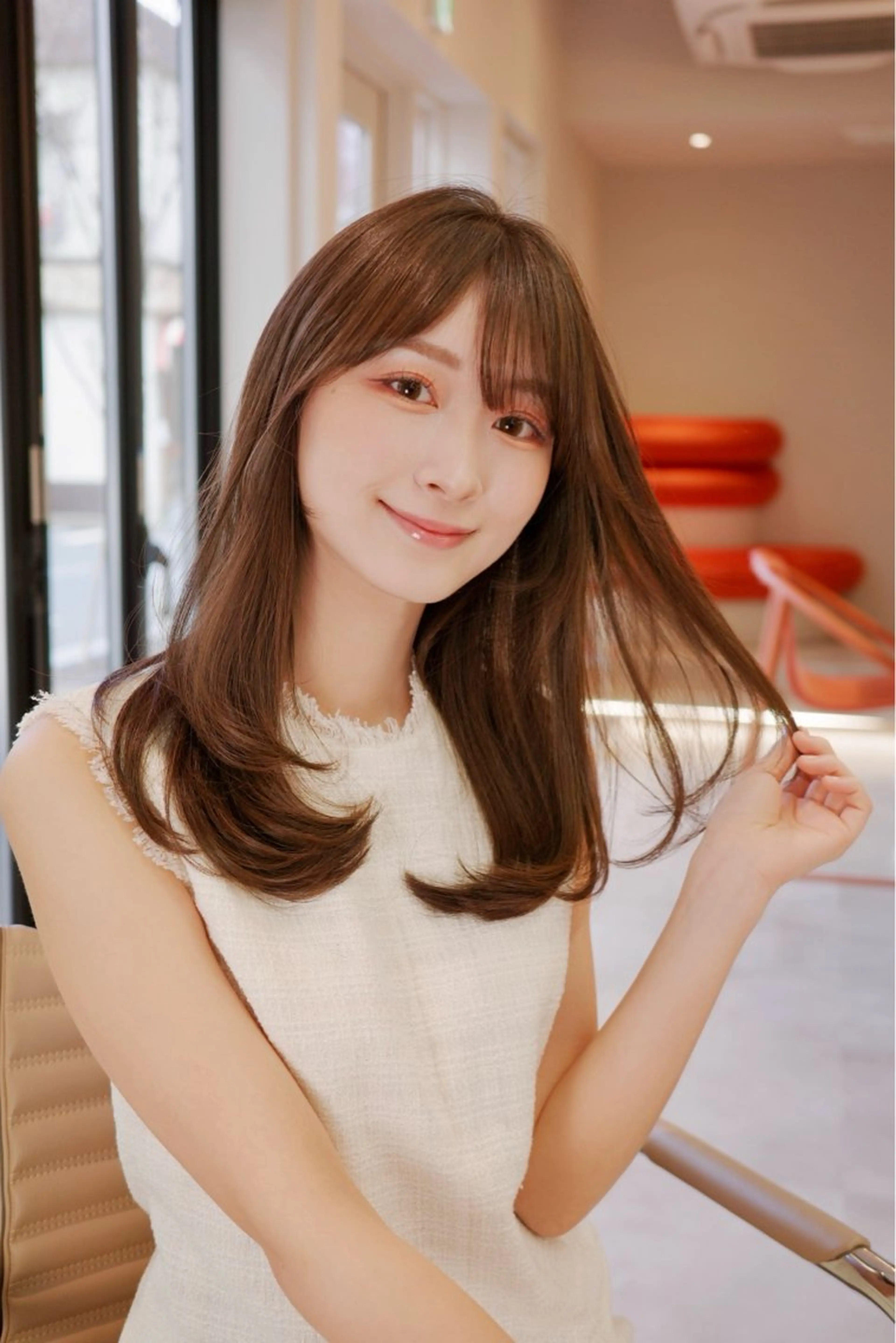 ミディアム カット ヘアカラー トリートメント La Bonheur hair reve 池袋西口所属・コテ巻き風パーマ /志村大成のヘアスタイル