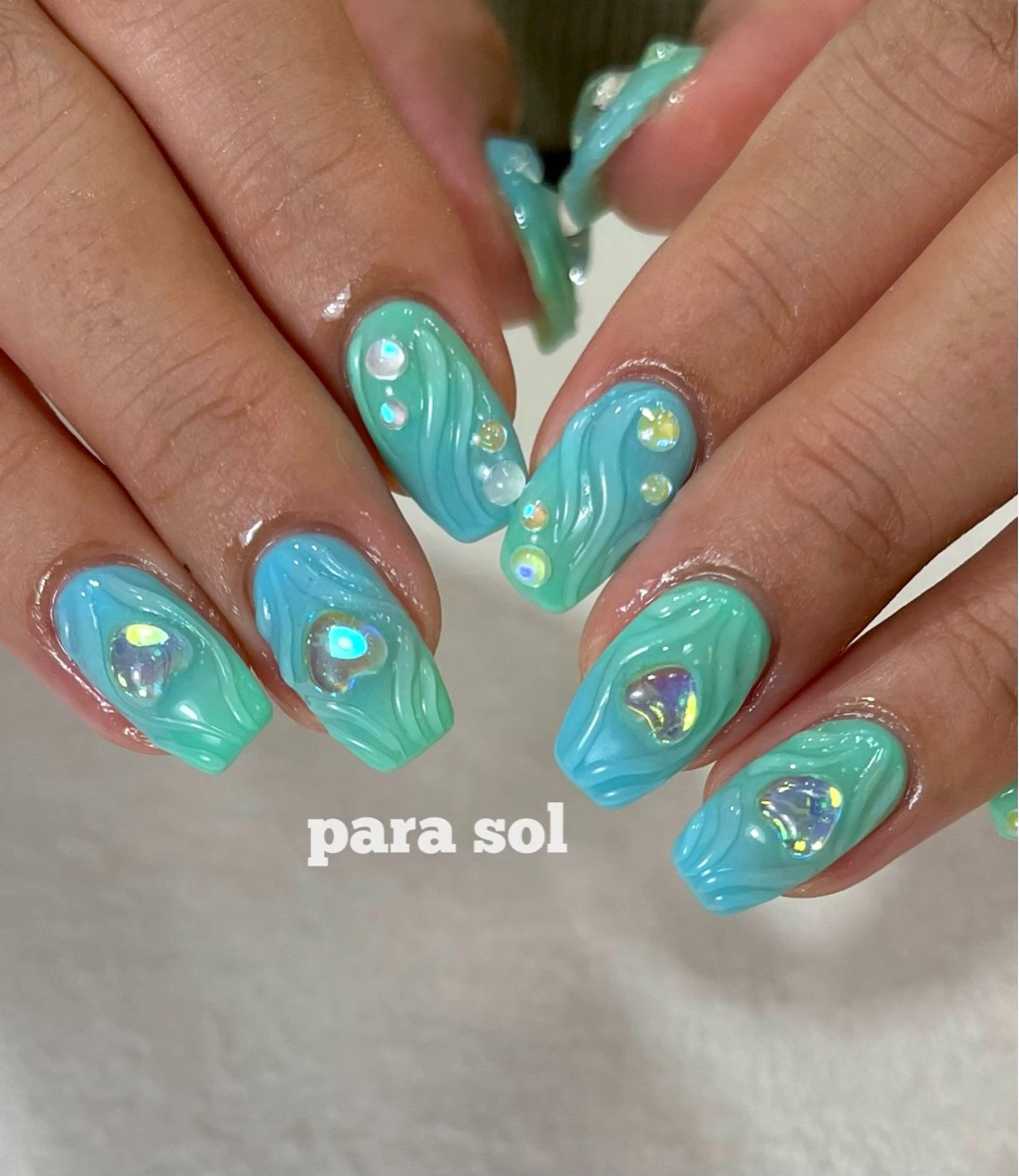ネイル ジェルネイル ハート キラキラネイル 水色 パラジェル ハンドネイル フットネイル para ☀︎ sol by BECK所属・Para Sol nail　Maoのネイルデザイン