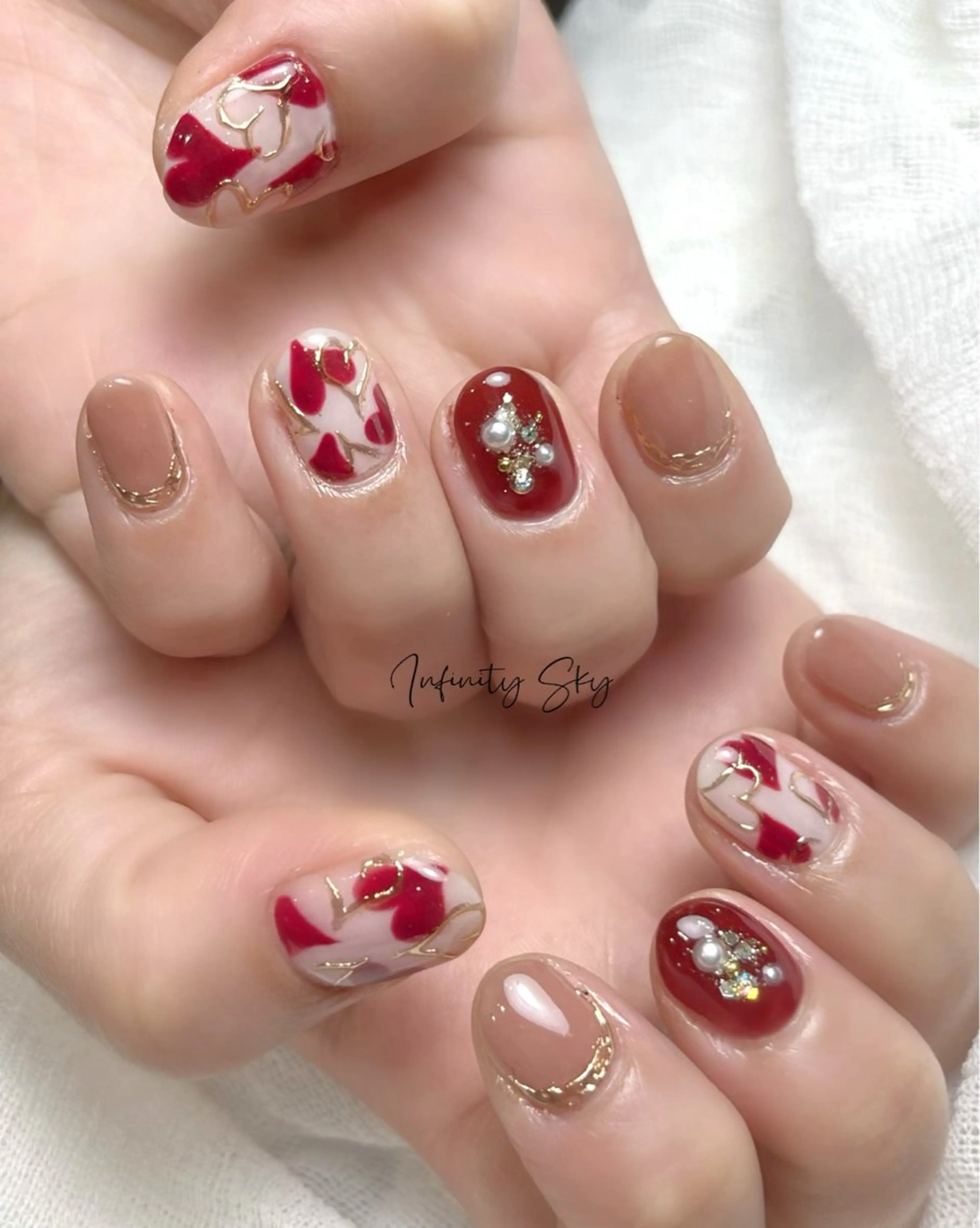 ネイル ボルドー ハート バレンタイン infinity skyのネイルデザイン