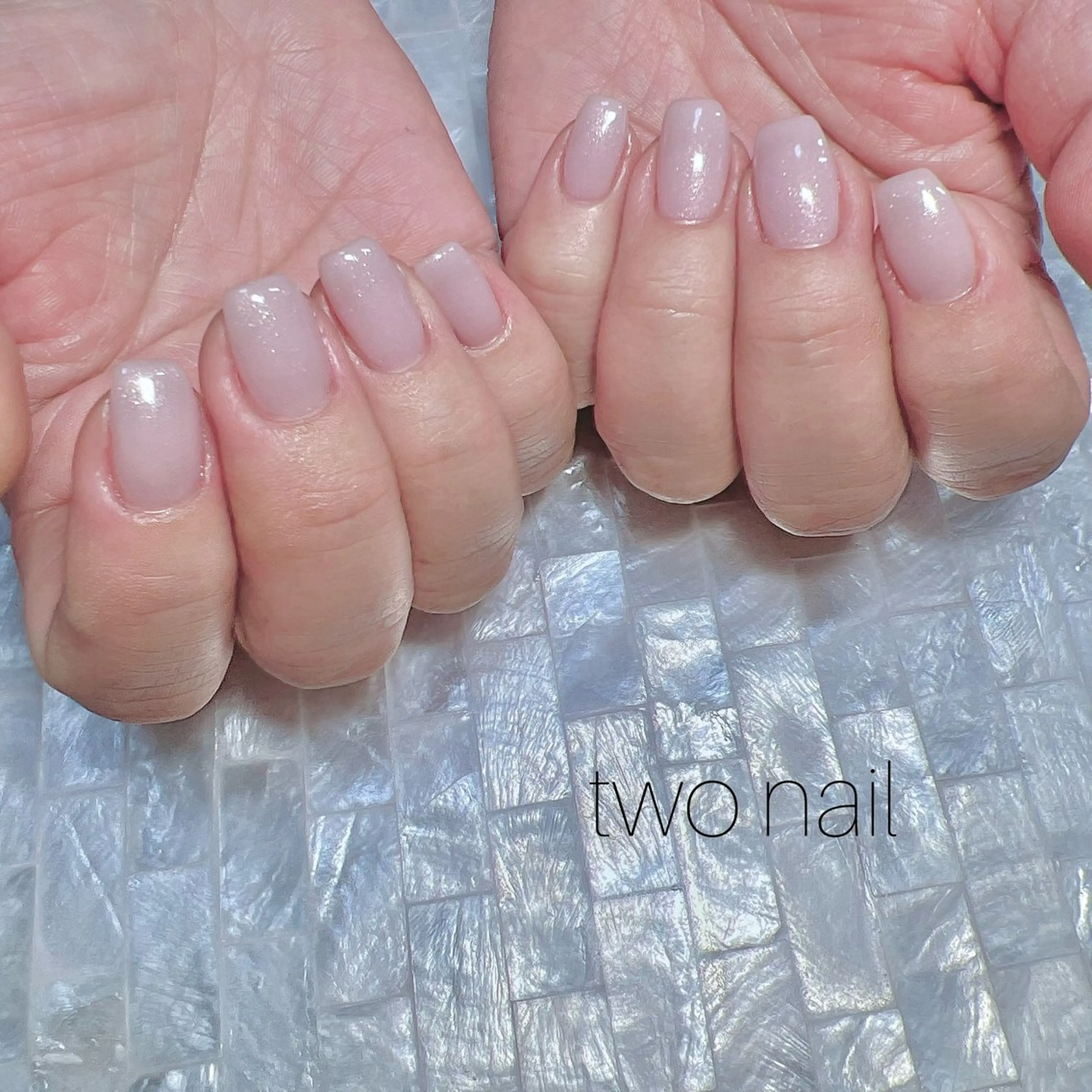 ネイル キラキラネイル ネイルチップ ホワイト ハンドネイル two nailのネイルデザイン