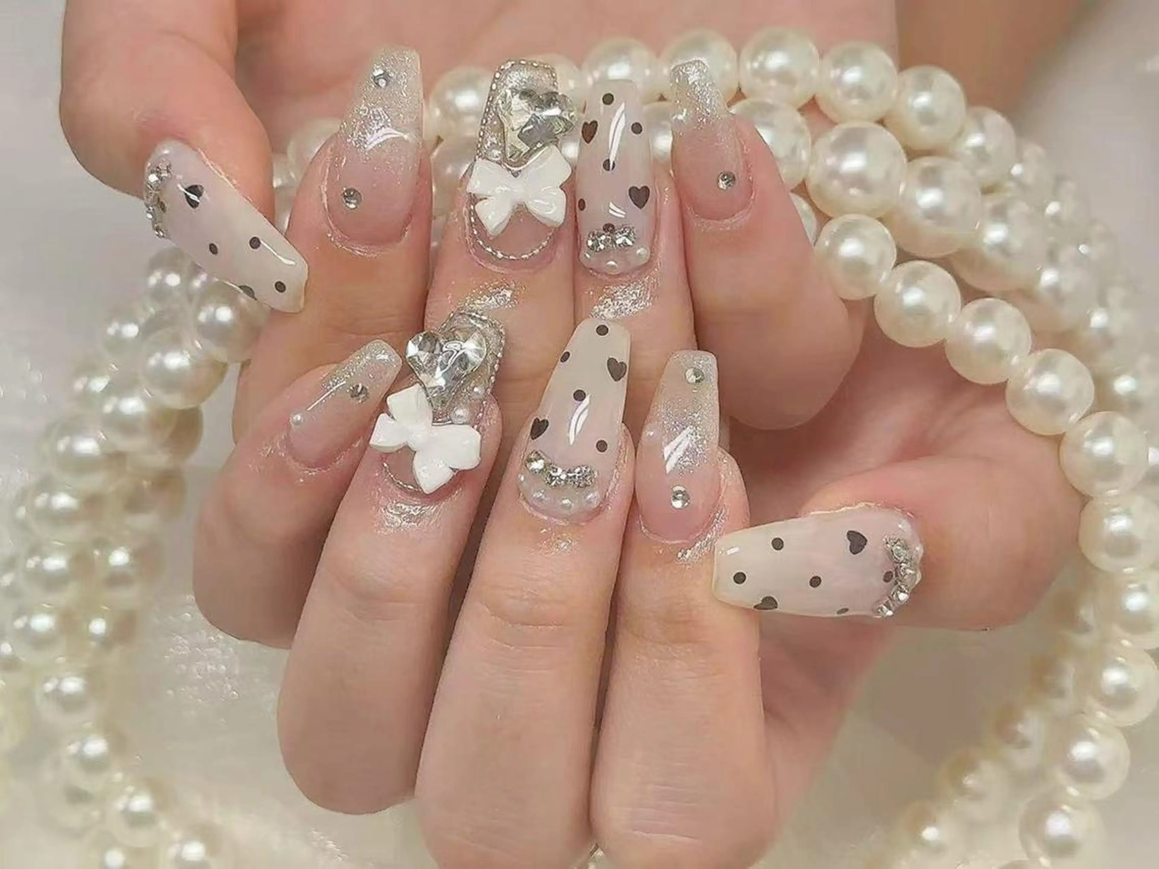 ネイル リボン ハンドネイル Ru na🍳のネイルデザイン