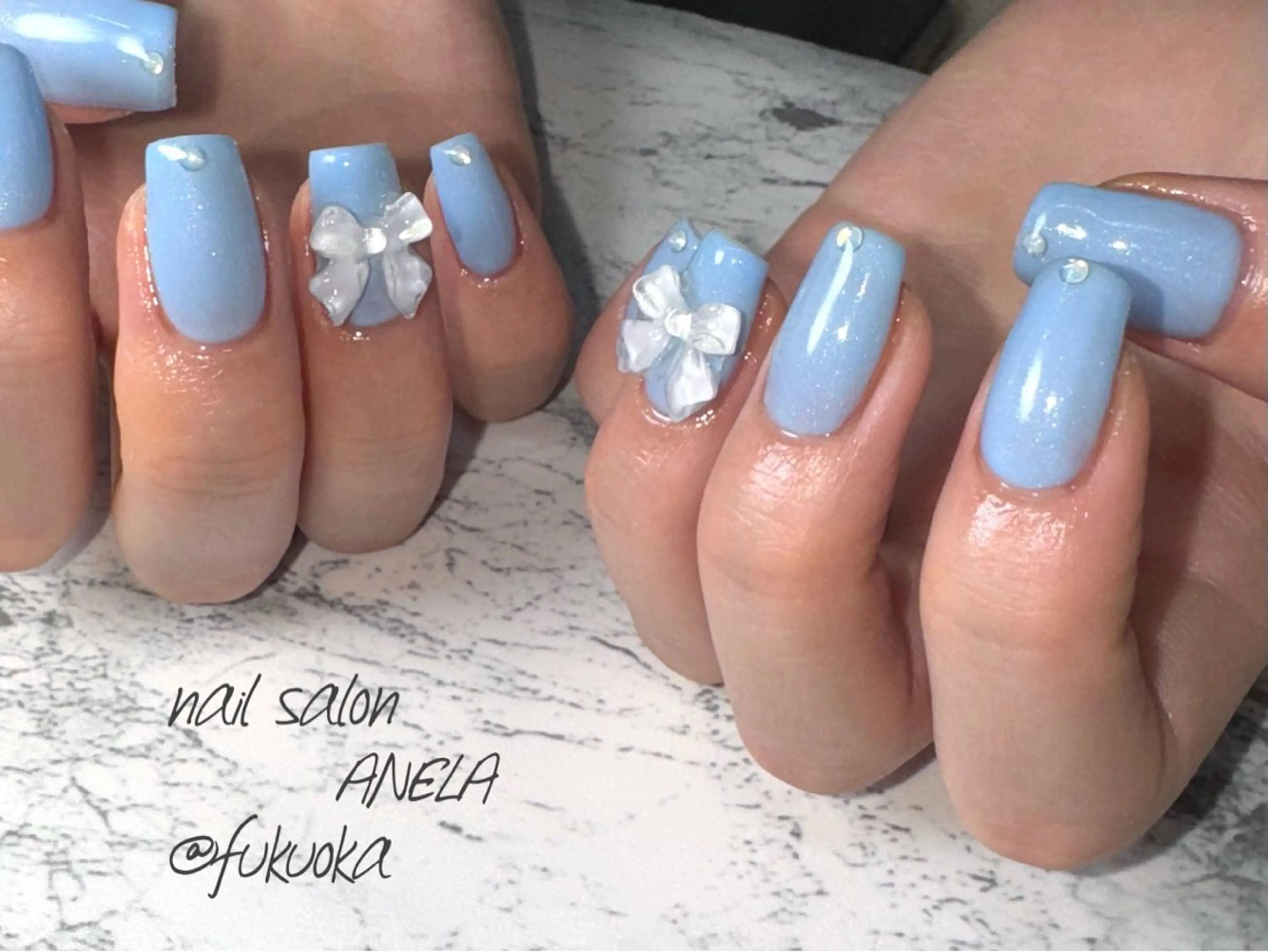ネイル ブルー リボン nail salon ANELA所属・nail salon ANELA mayaのネイルデザイン