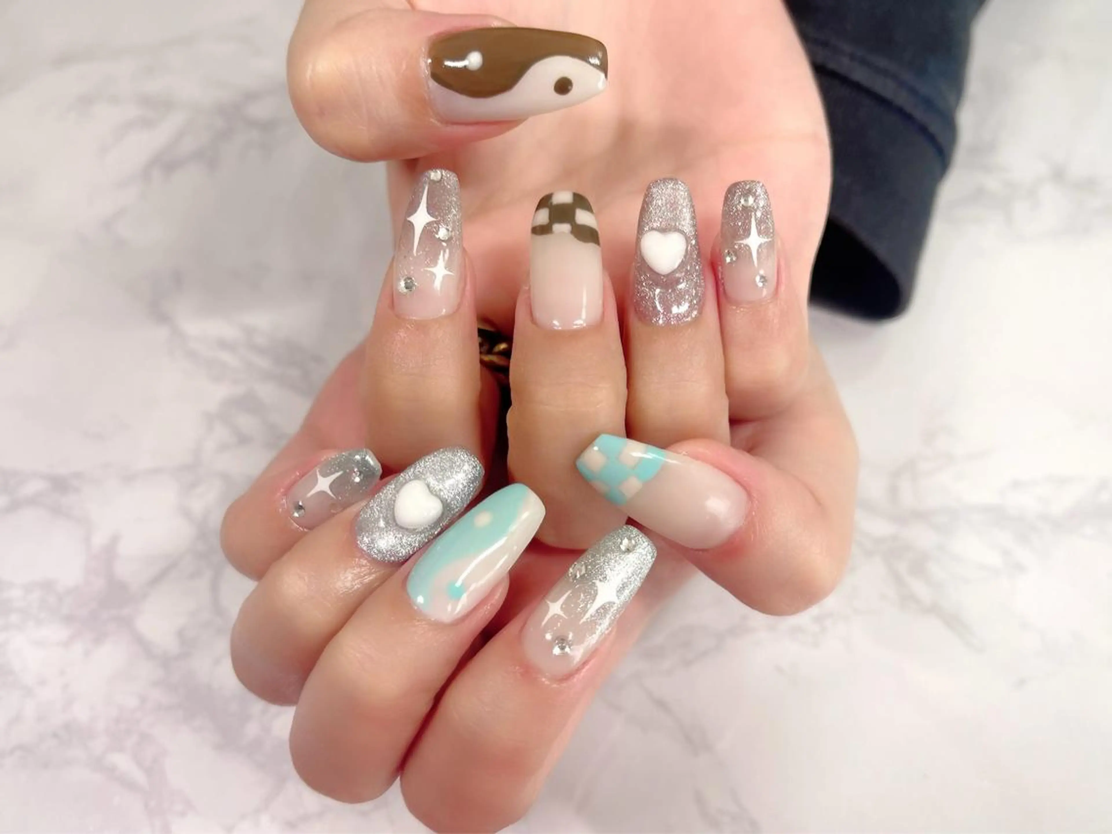 ネイル ブラウン 水色 ハンドネイル KURELLY所属・Nail Salon KURELLYのネイルデザイン