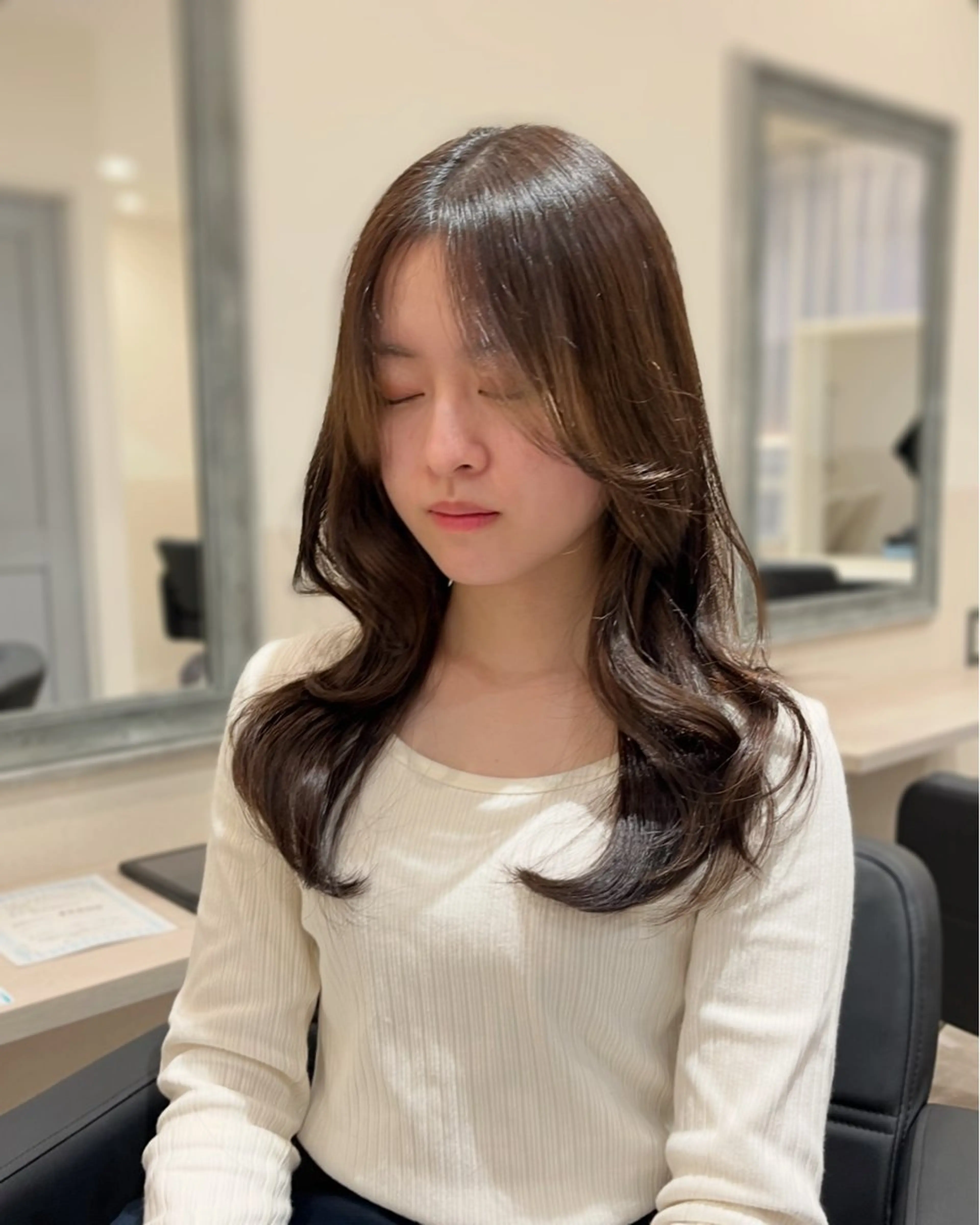 韓国風コテ巻き【練習モデル】の写真