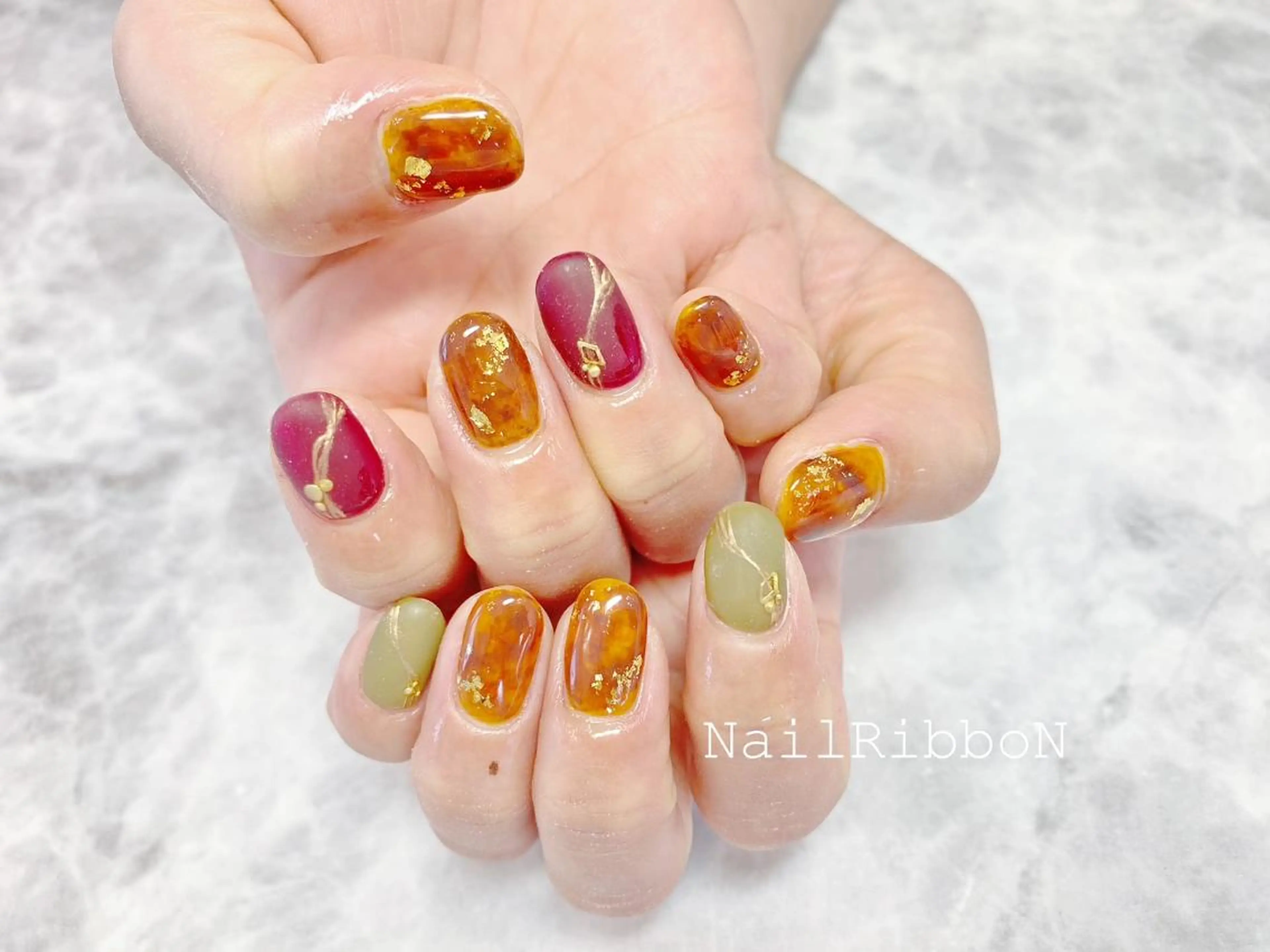 ネイル ネイルリボン 受付スタッフのネイルデザイン