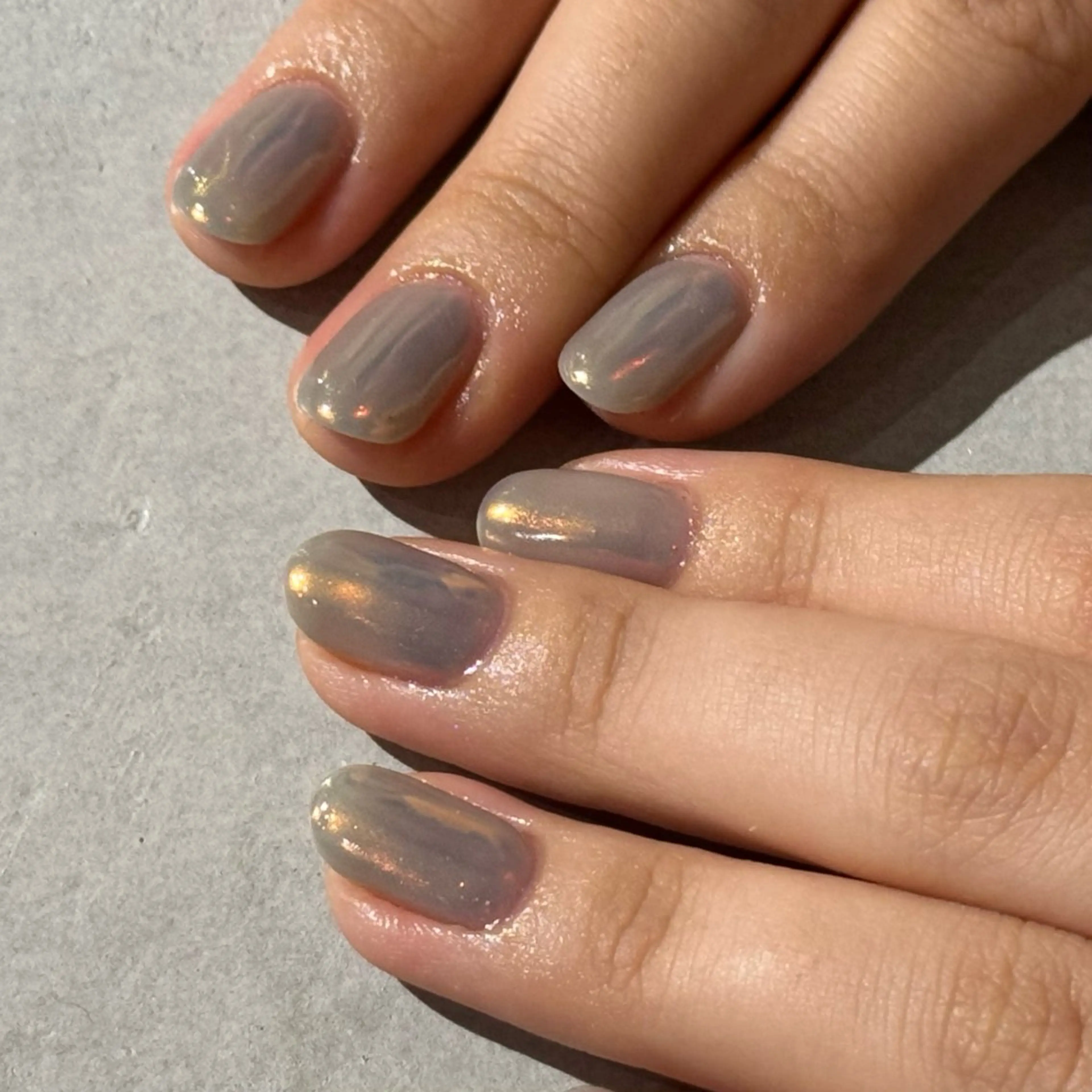 ネイル オーロラネイル オレンジ ハンドネイル Tigris.所属・Tigris. sadamotoのネイルデザイン