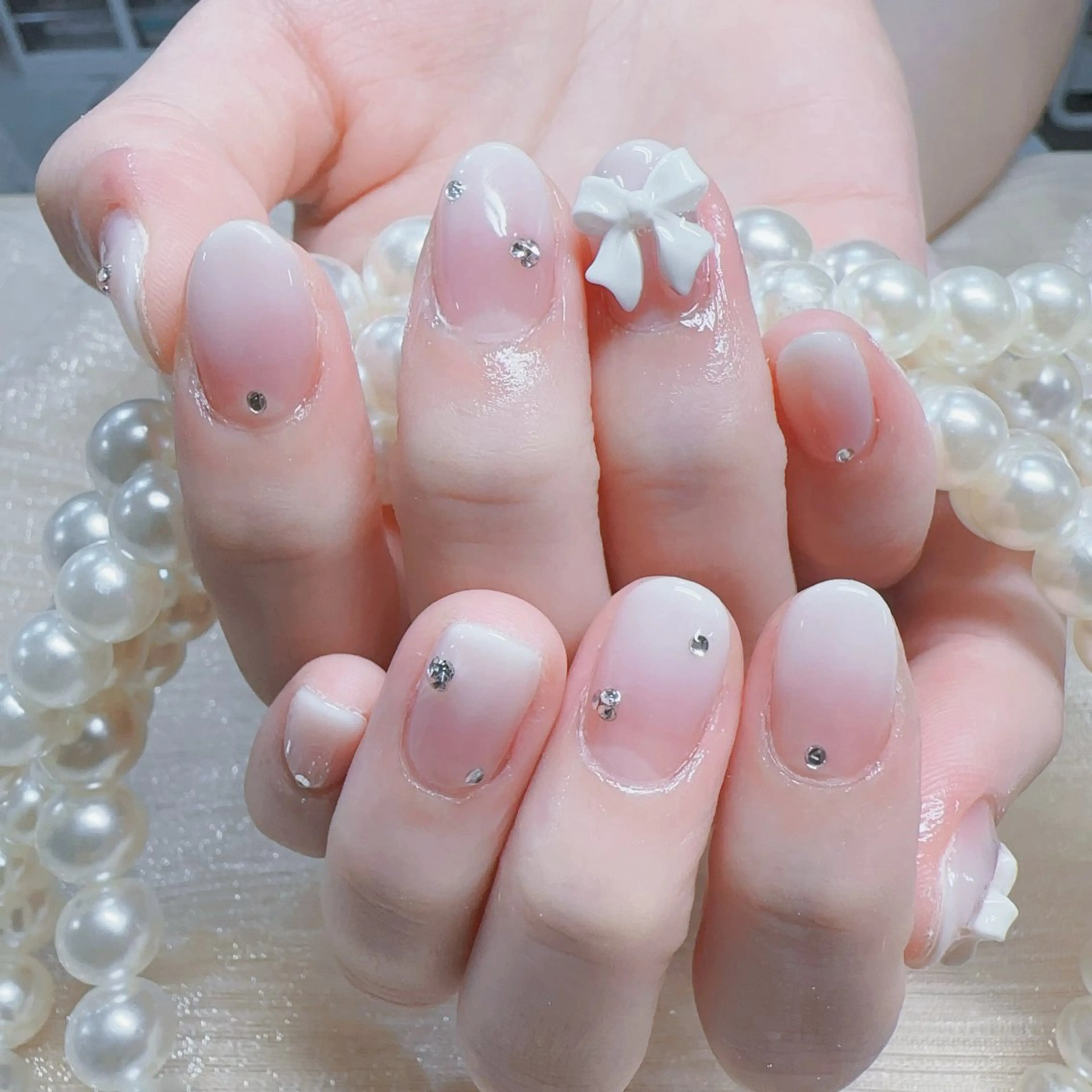 ネイル グラデーション リボン ハンドネイル MO MO🐻のネイルデザイン