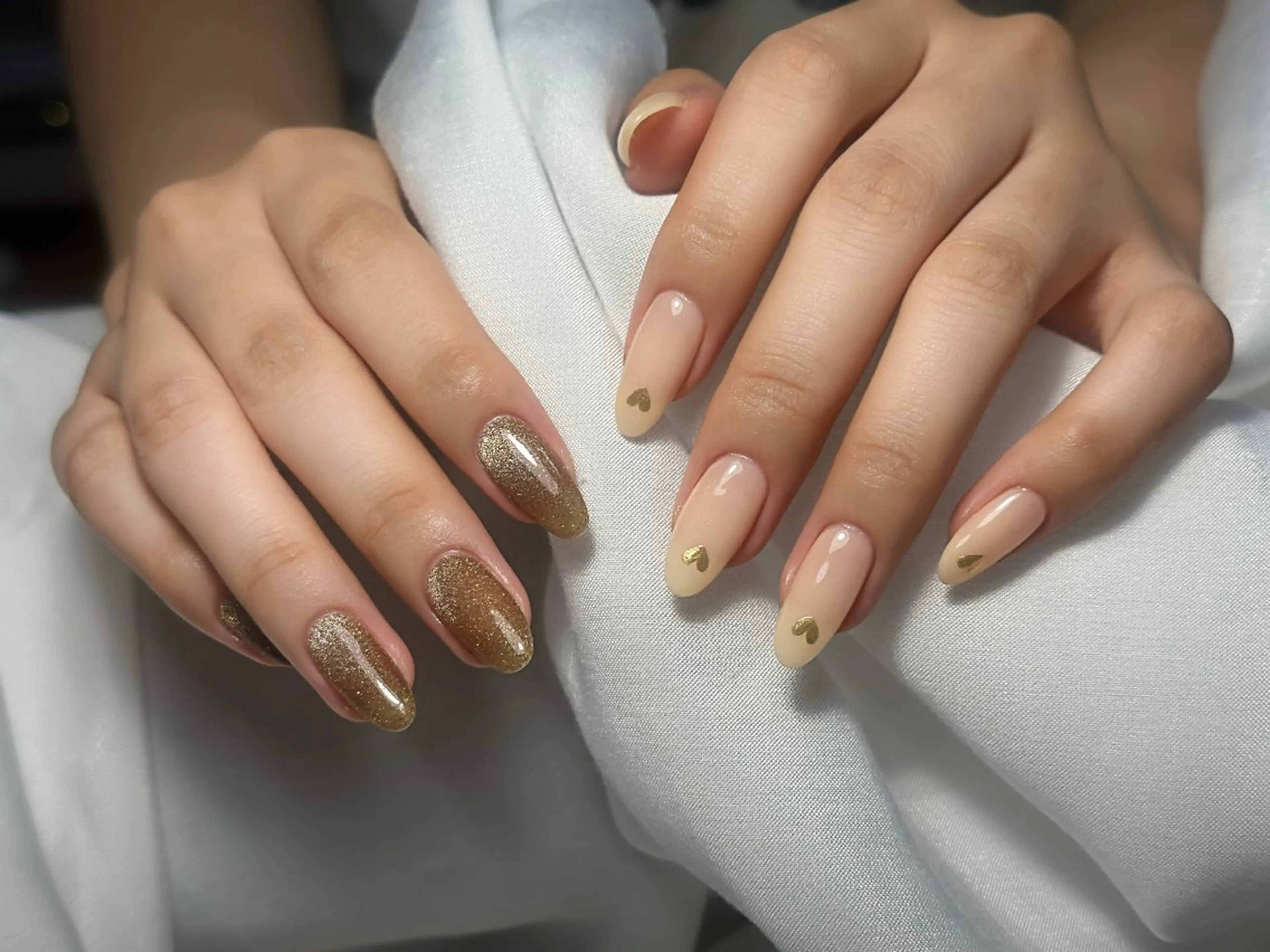 ネイル ブルー チークネイル フレンチネイル ハート ホログラムネイル ハンドネイル インフィニティ ネイルサロンのネイルデザイン