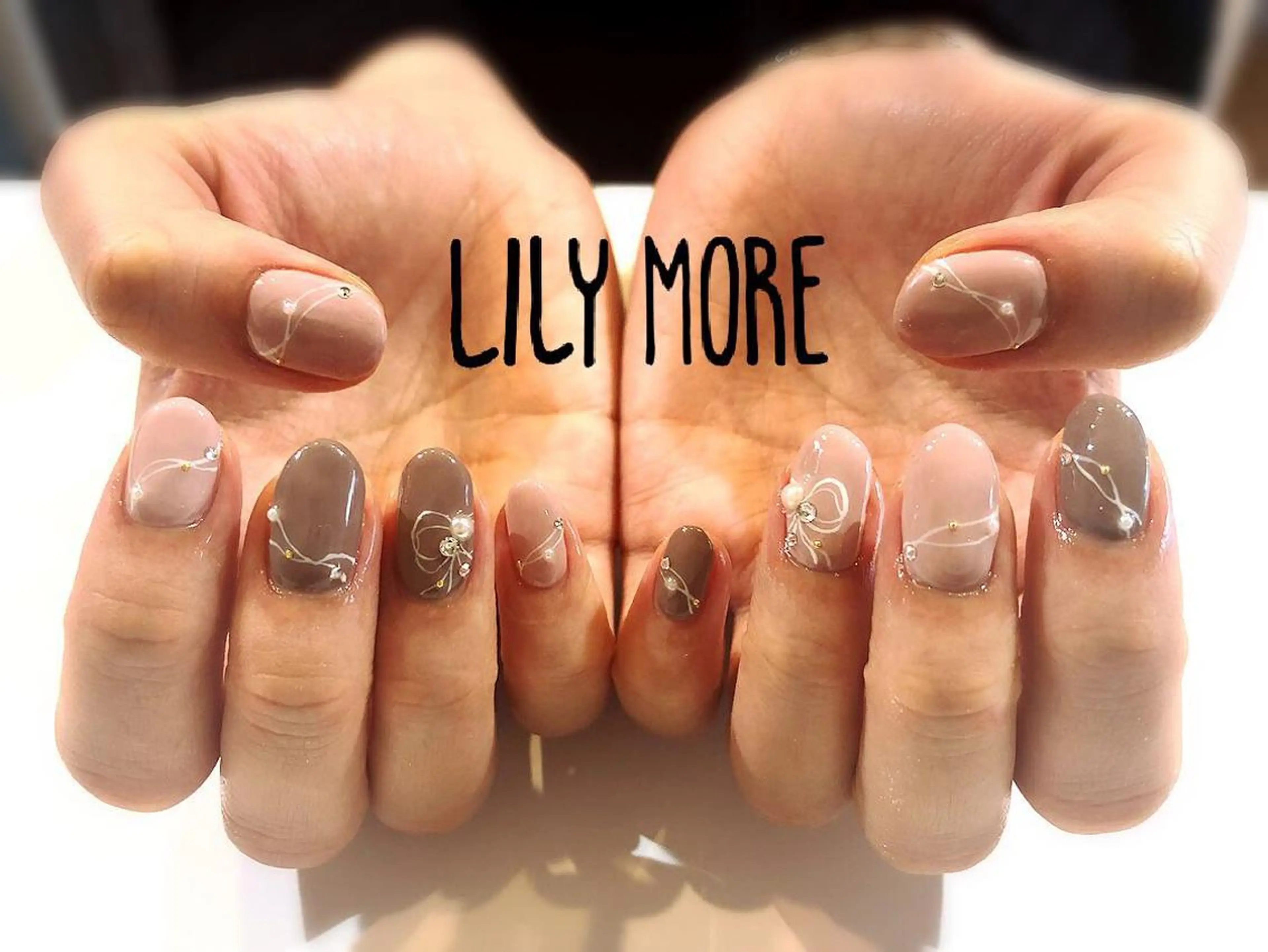 ネイル リボン Lily closetのネイルデザイン