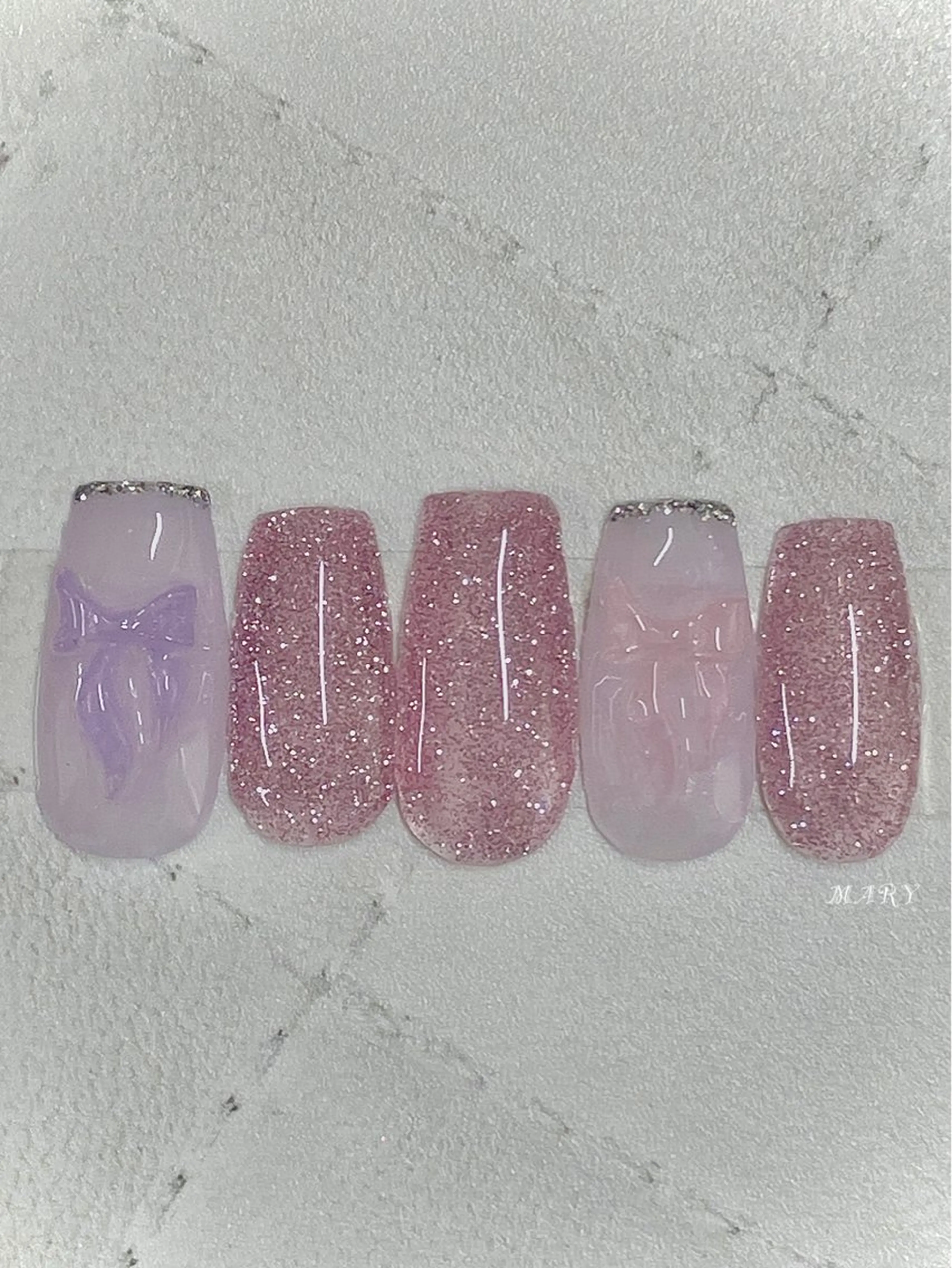ネイル フラッシュネイル ニュアンスネイル ピンク パープル リボン ハンドネイル Mary nail所属・Mary nail .narumiのネイルデザイン
