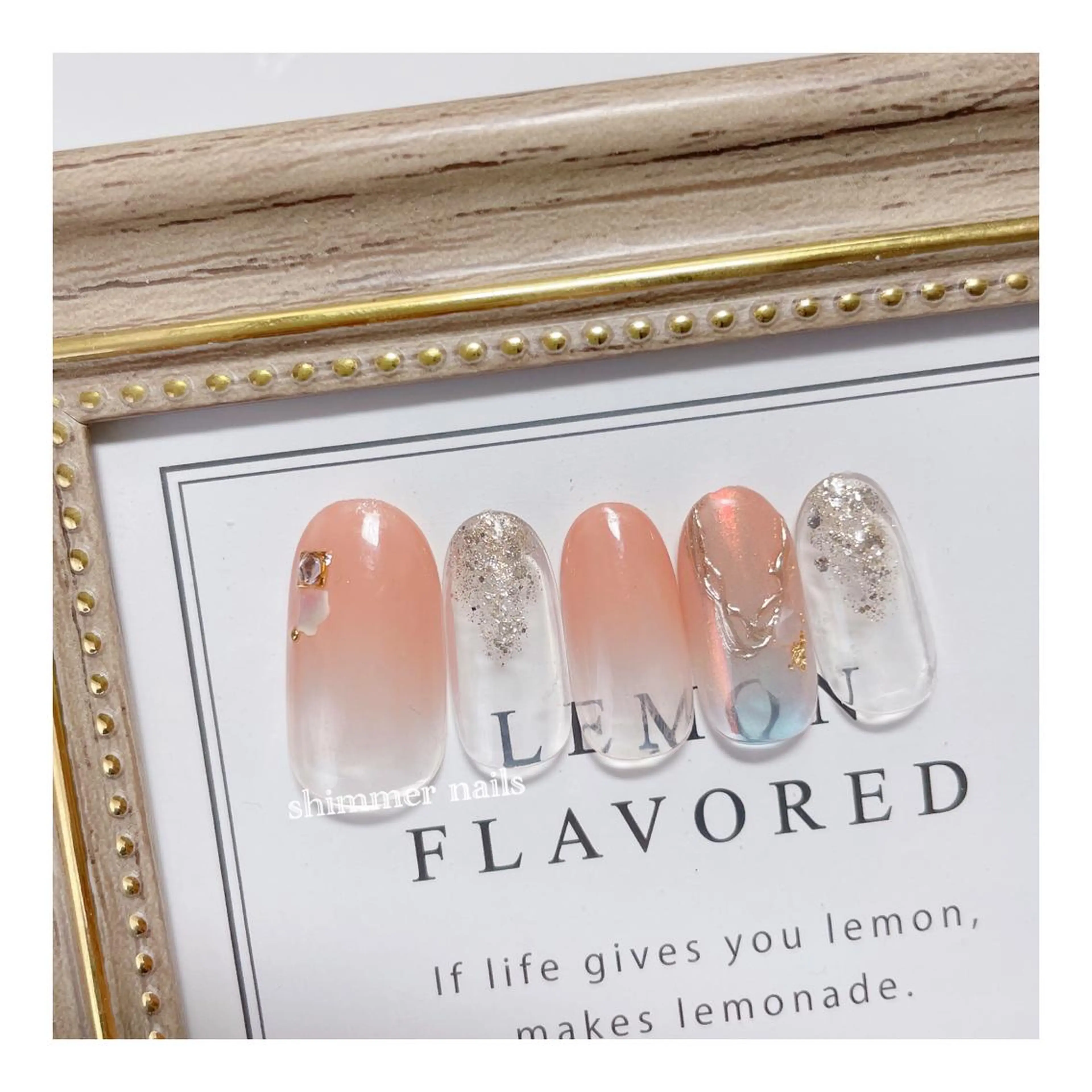 ネイル オーロラネイル オレンジ ピンク shimmer nailsのネイルデザイン