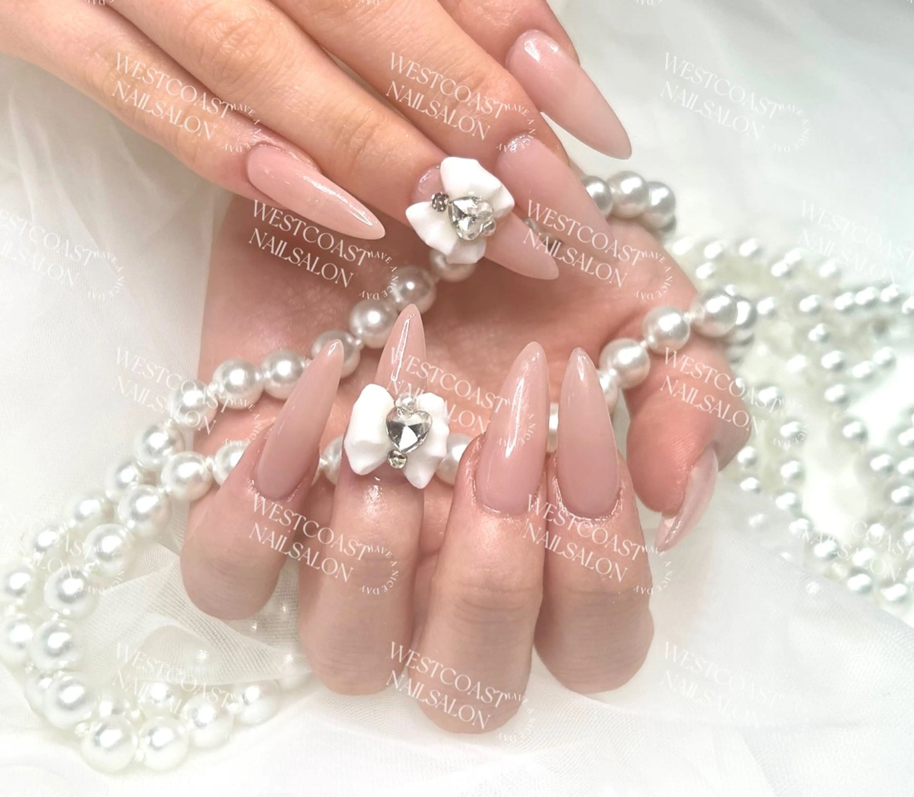 ネイル ハンドネイル ハンドケア リボン、ガーリー パーツ放題専門店のネイルデザイン