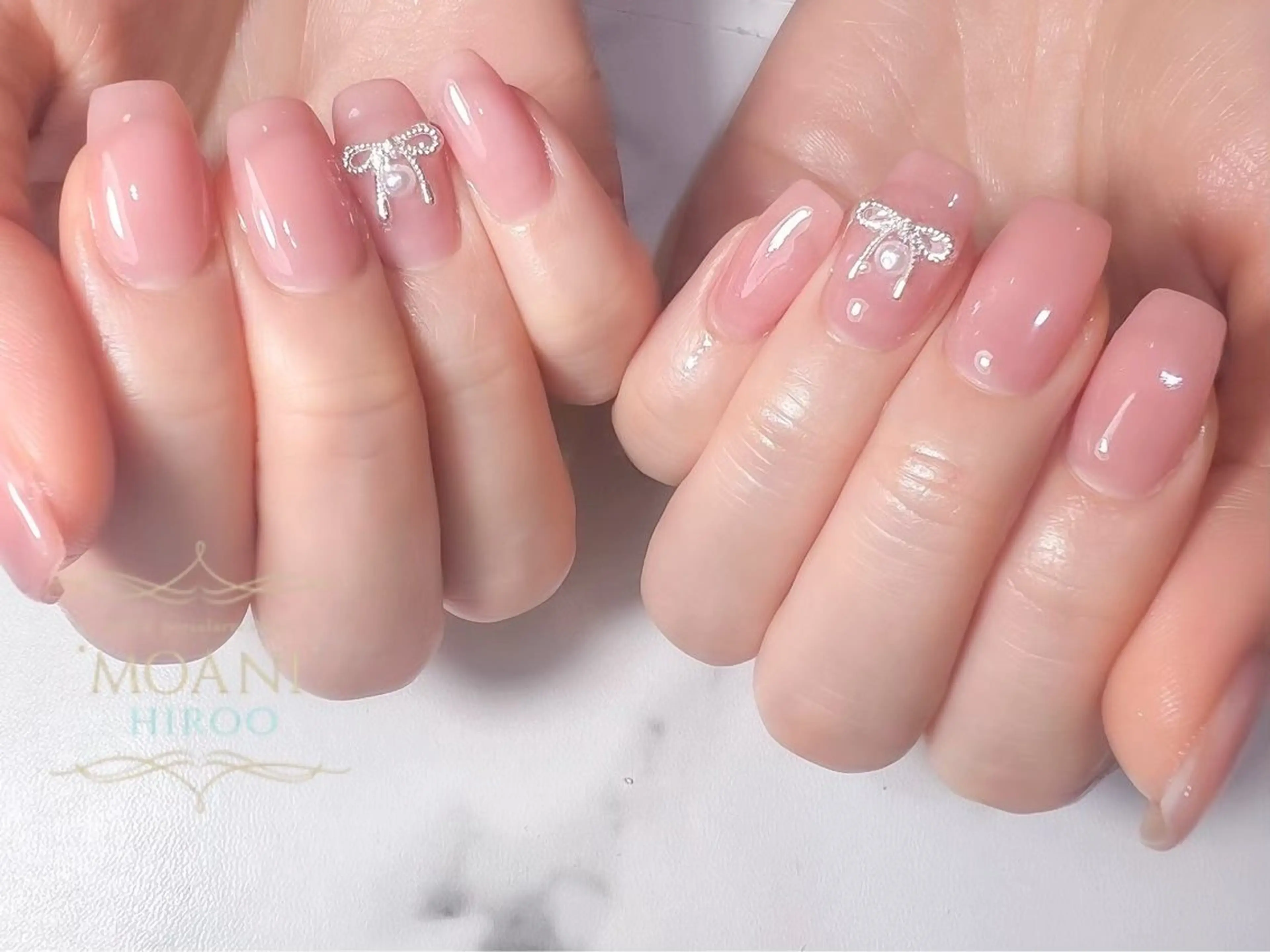 ネイル ピンク リボン フィルインネイルサロンMOANIHiroo 恵比寿店所属・🌷HARUNA🌷 恵比寿店のネイルデザイン