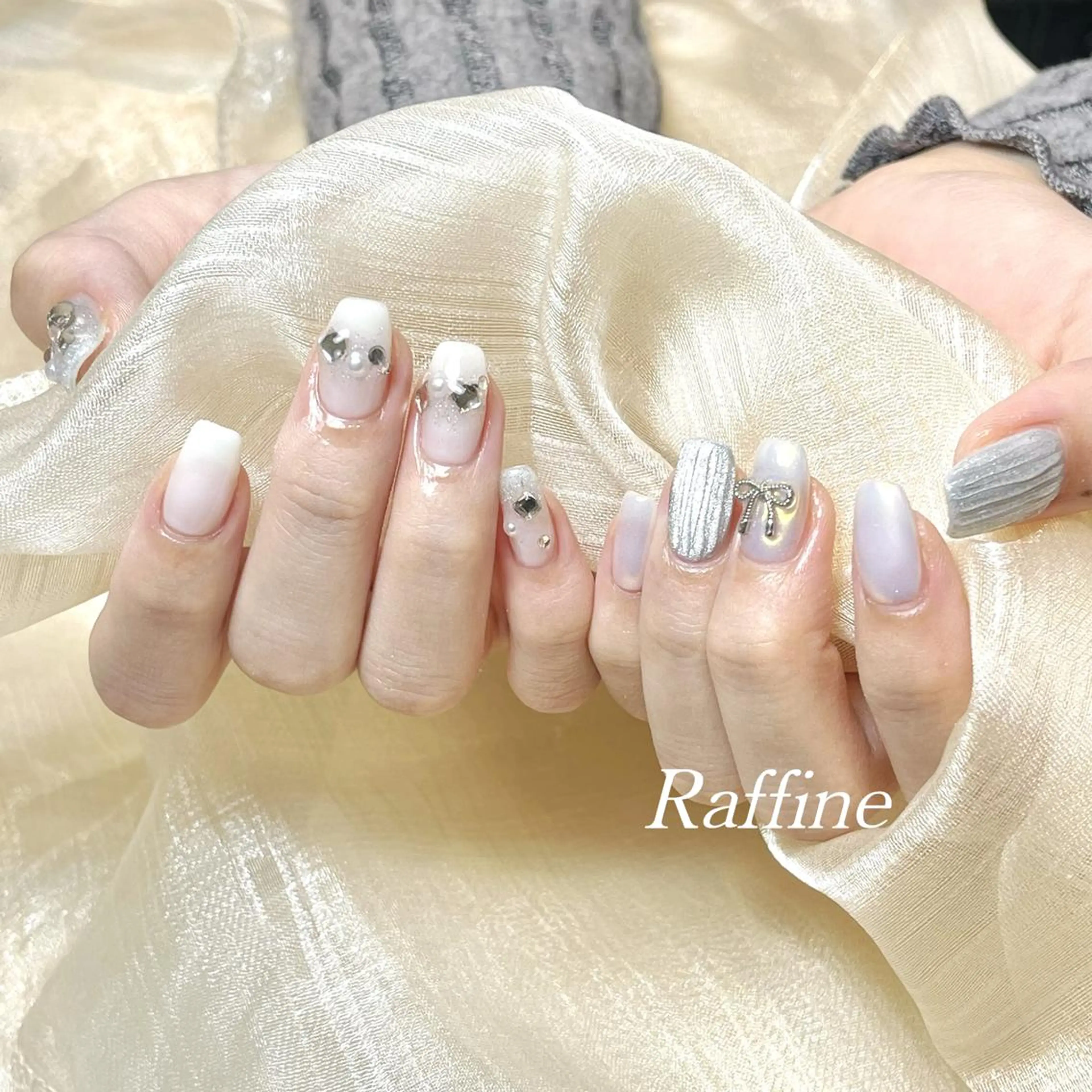 ネイル RAFFINE 月🦋🩵のネイルデザイン